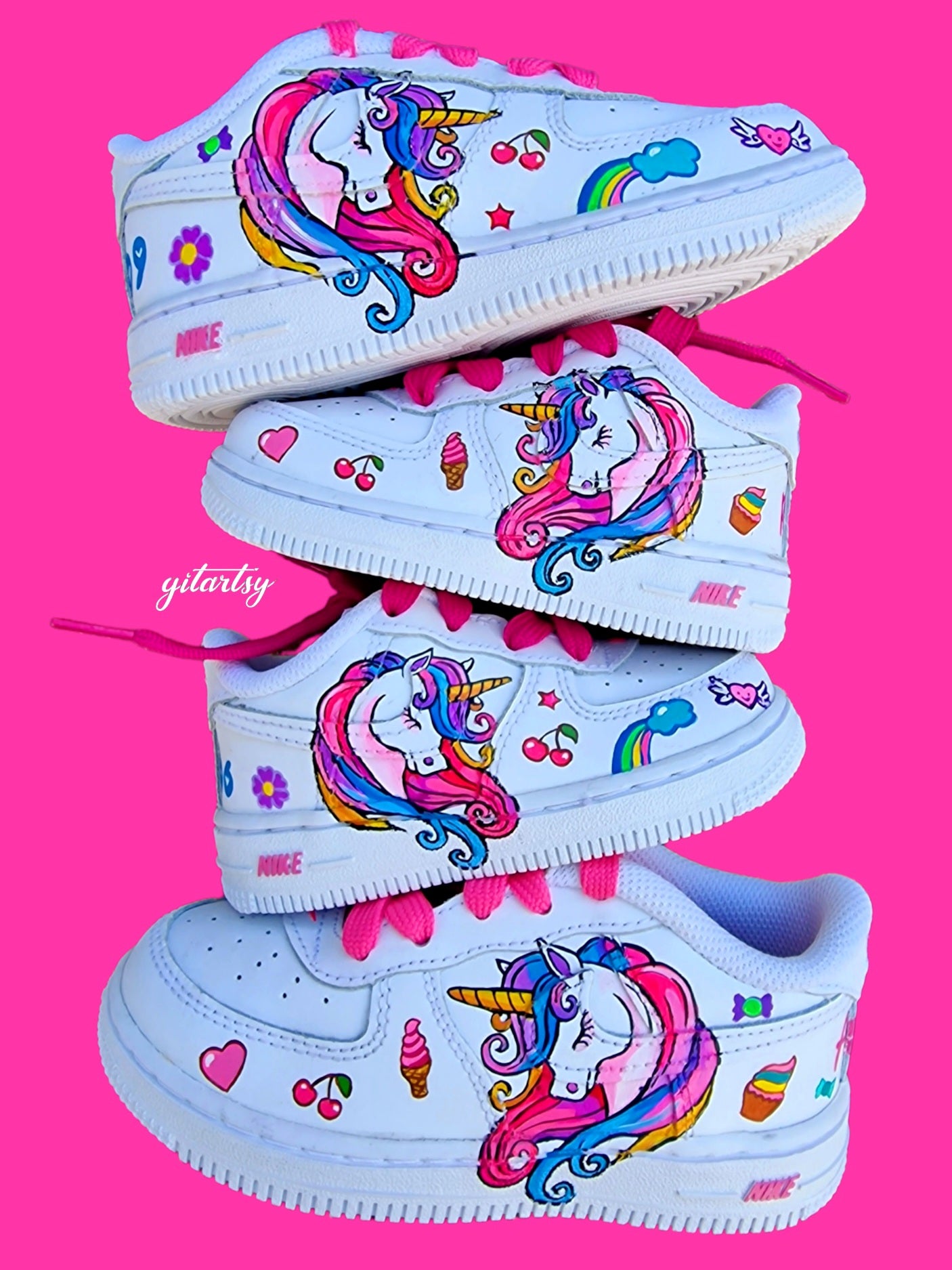 Custom hand-painted Nike kids sneakers with a whimsical unicorn design in rainbow colors, cherries, ice cream, hearts, and cute accents. Each pair features the child’s name and birthdate or special date painted on the back heel, with bright pink laces for added charm. Perfect personalised gift for birthdays, baby showers, or everyday wear for girls who love unicorns.