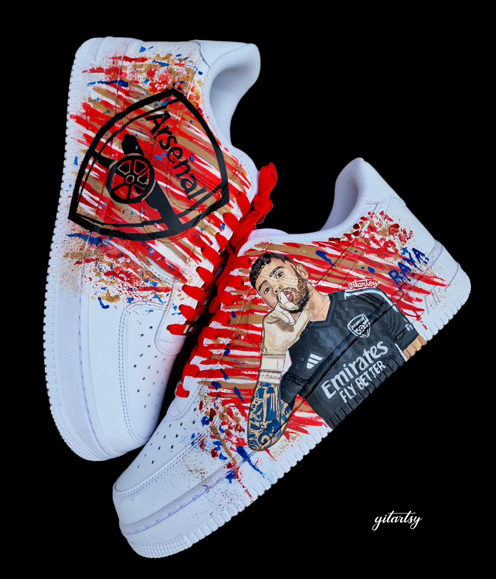 Hand-painted custom Nike Air Force 1 sneakers featuring David Raya in Arsenal goalkeeper kit, Arsenal crest, Spanish flag and colors, vibrant football-inspired splatter artwork, crafted by Gitartsy.