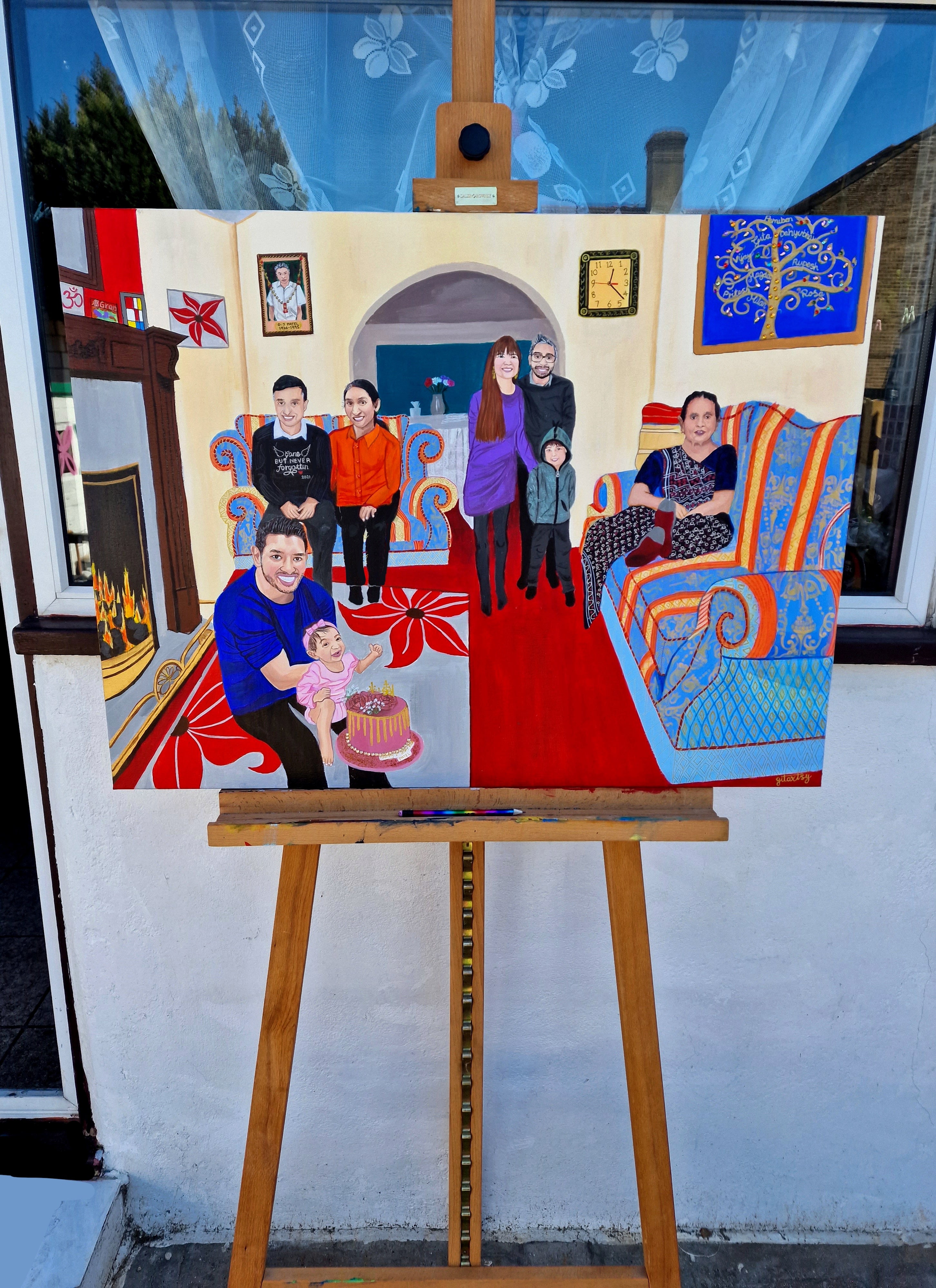 Hand‑painted large acrylic family portrait on canvas portraying an extended family gathered in a colourful living room: children seated on patterned sofas, parents and grandparents standing or relaxing, a toddler reaching toward a birthday cake, fireplace ablaze, vibrant rugs and ornate upholstery rendered in rich blues, reds, and golds, showcasing intricate textures and lifelike facial expressions on a gallery‑sized canvas.