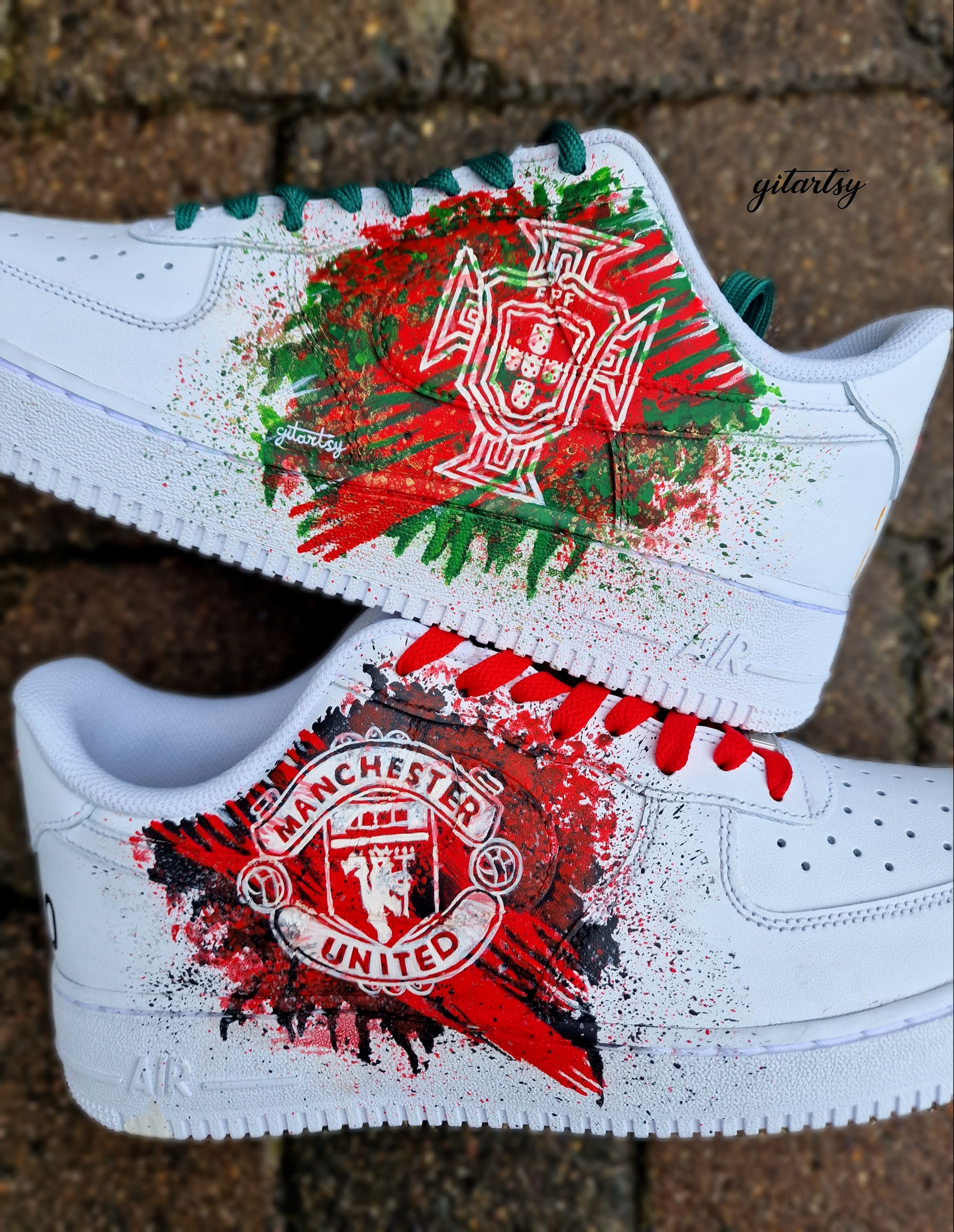 "Custom hand-painted Nike Air Force 1 sneakers featuring Manchester United and Portugal national football team crests, splattered in bold red, green, and black paint with unique details, crafted by Gitartsy."