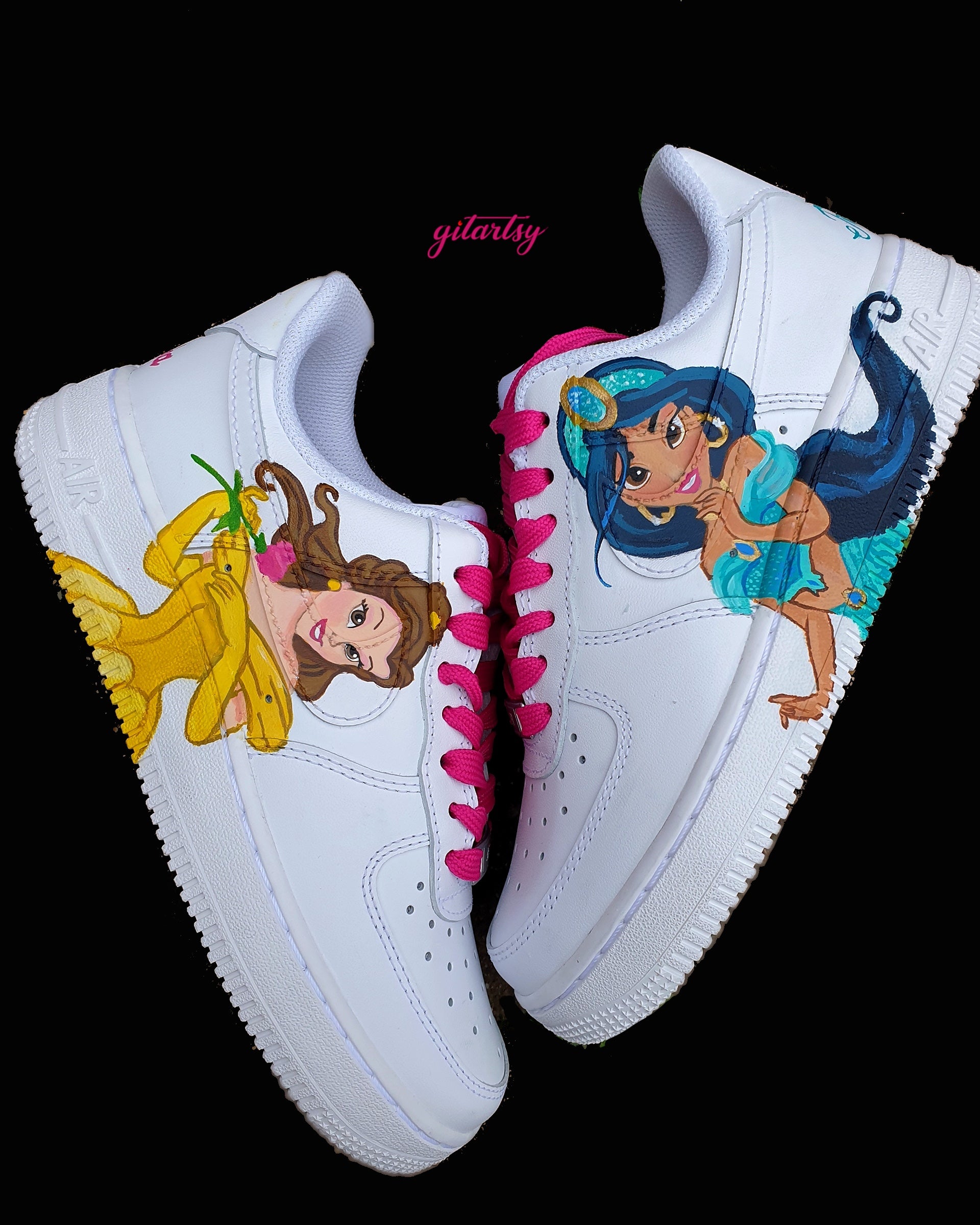 Custom hand-painted Nike AF1 kids sneakers featuring detailed Disney princess portraits of Jasmine and Belle on a white leather base with pink laces. Unique wearable art with vibrant colors, sealed for protection, perfect for kids who love Disney fairytales.