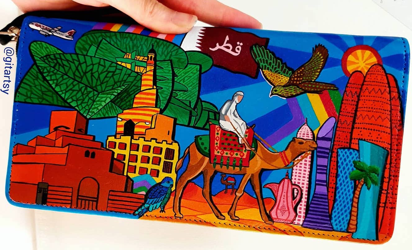 Custom hand-painted wallet featuring Qatar skyline in colourful pop art style