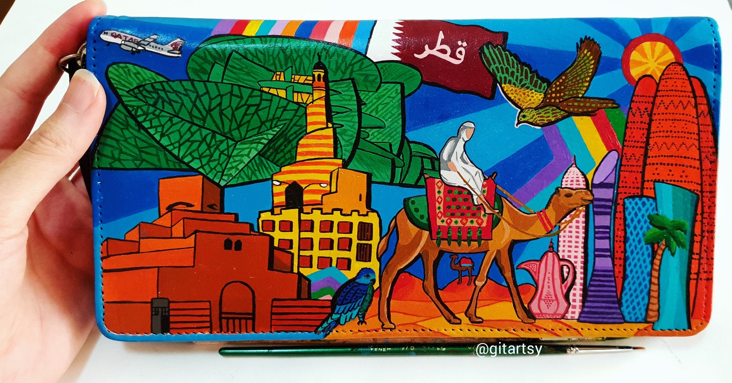 Vibrant pop art style Qatar skyline design on hand-painted wallet