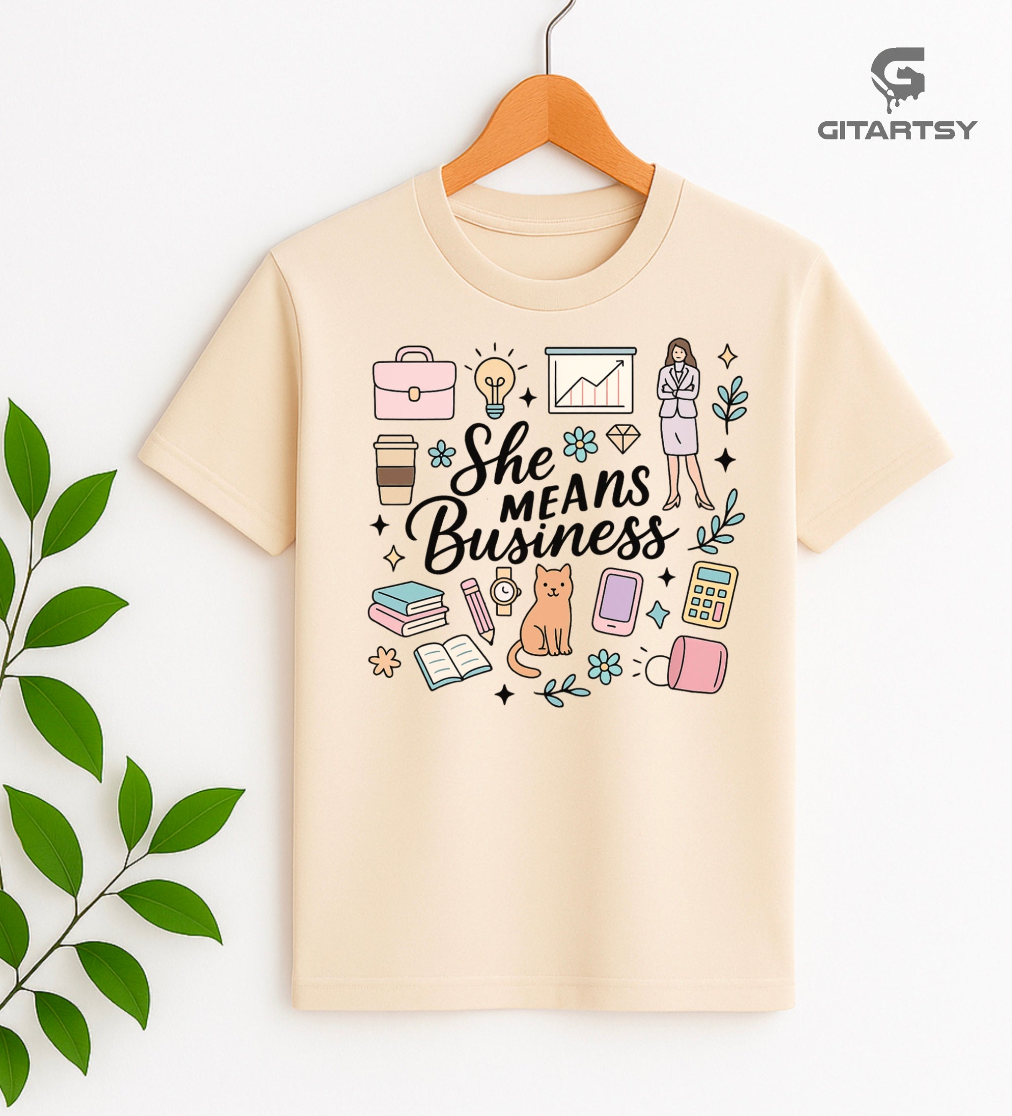 T-shirt with pastel business-themed illustrations and the phrase “She Means Business” – ideal for female entrepreneurs and businesswomen.