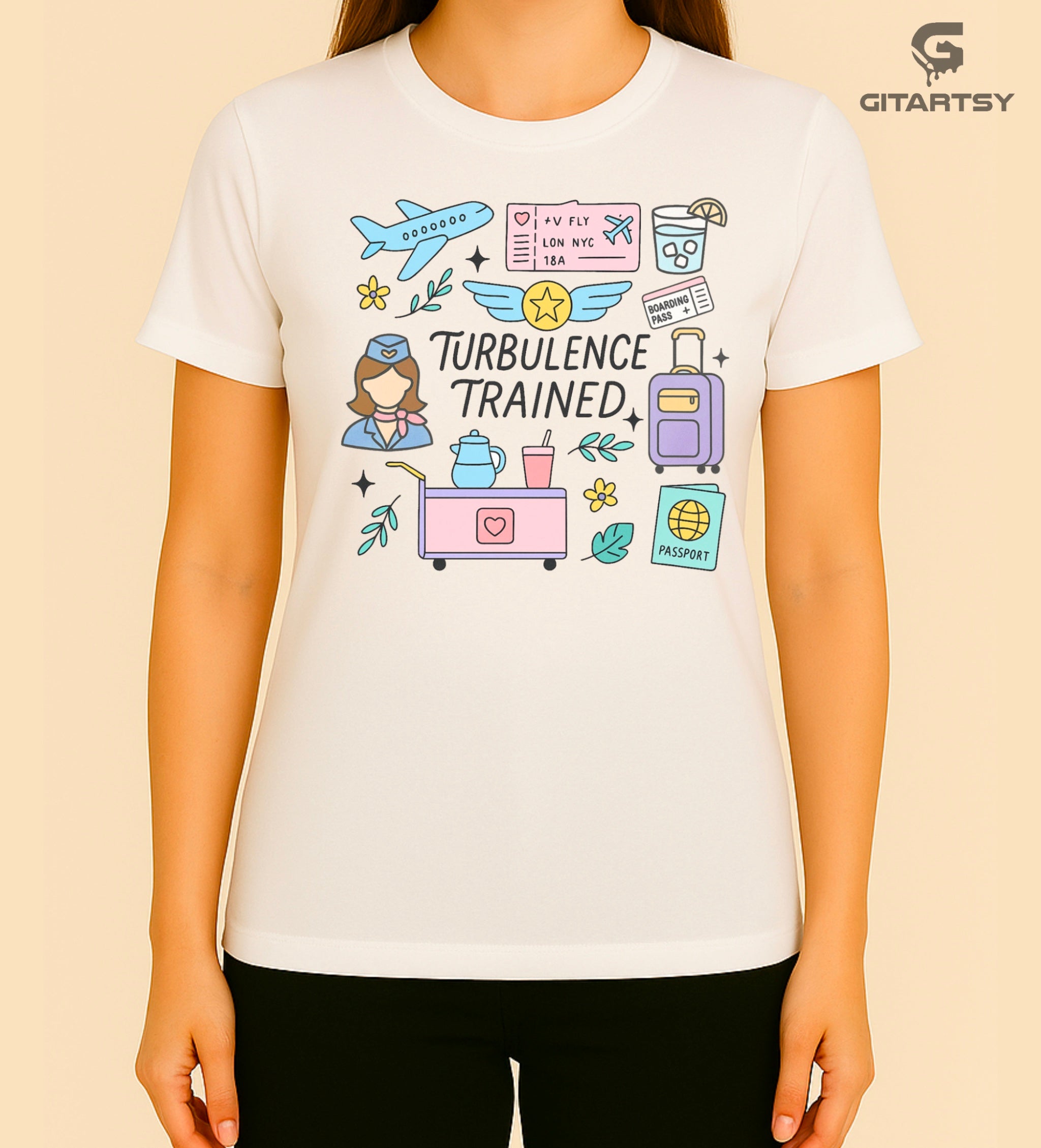 T-shirt featuring the quote "Turbulence Trained" with pastel illustrations of airplane, boarding pass, drinks cart, and flight attendant – ideal for cabin crew and aviation professionals.