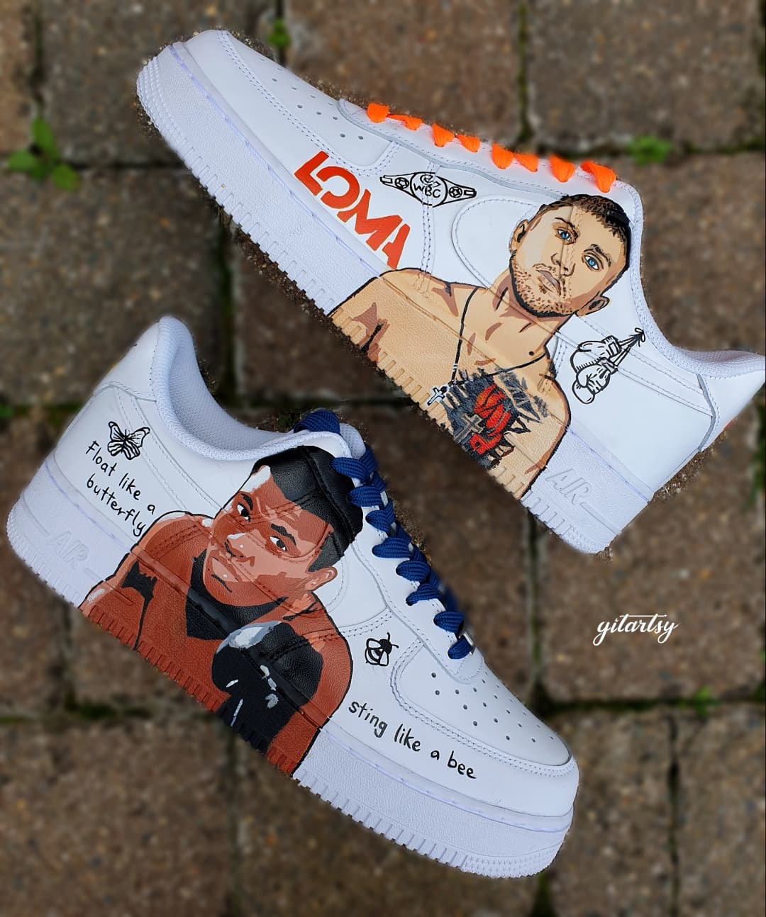 "Hand-painted Nike Air Force 1 sneakers featuring detailed portraits of boxing legends Muhammad Ali and Vasiliy Lomachenko, custom artwork with boxing gloves, quotes, and championship symbols, by Gitartsy."

