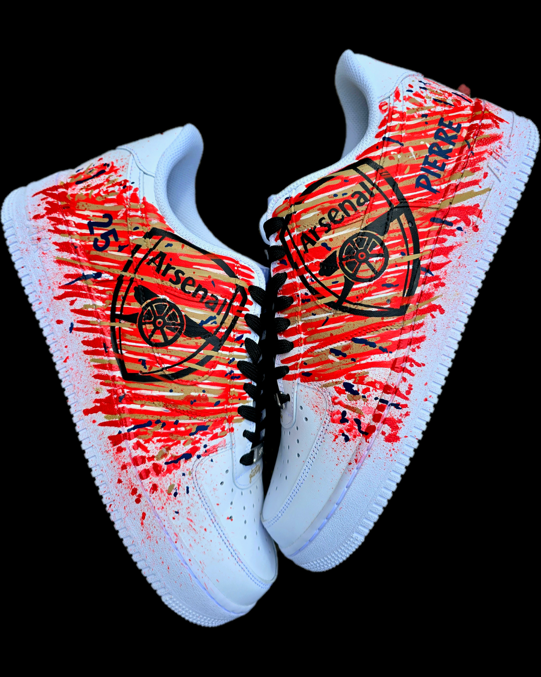 Custom hand-painted Nike Air Force 1 sneakers with Arsenal FC-inspired design, featuring red, gold, and navy brush strokes, personalized details like player name and number, Arsenal logo, and splatter effect art—crafted on a genuine white leather Nike AF1 base by Gitartsy.

