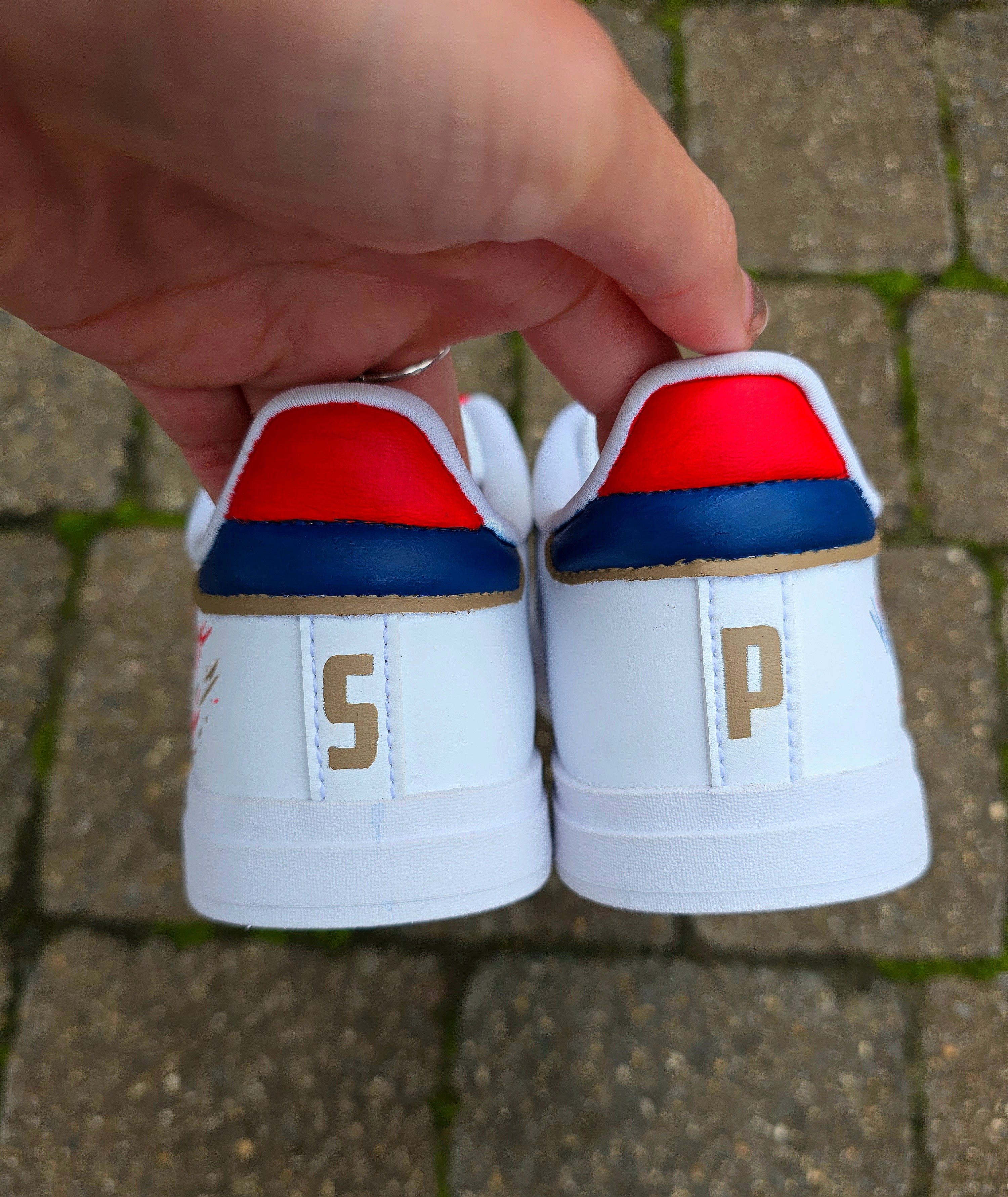 Arsenal FC Football Custom Hand-Painted Adidas Sneakers - Hand Painted with red, gold and blue artistic brushstrokes. Realistic arsenal fc logo and gunners logo
