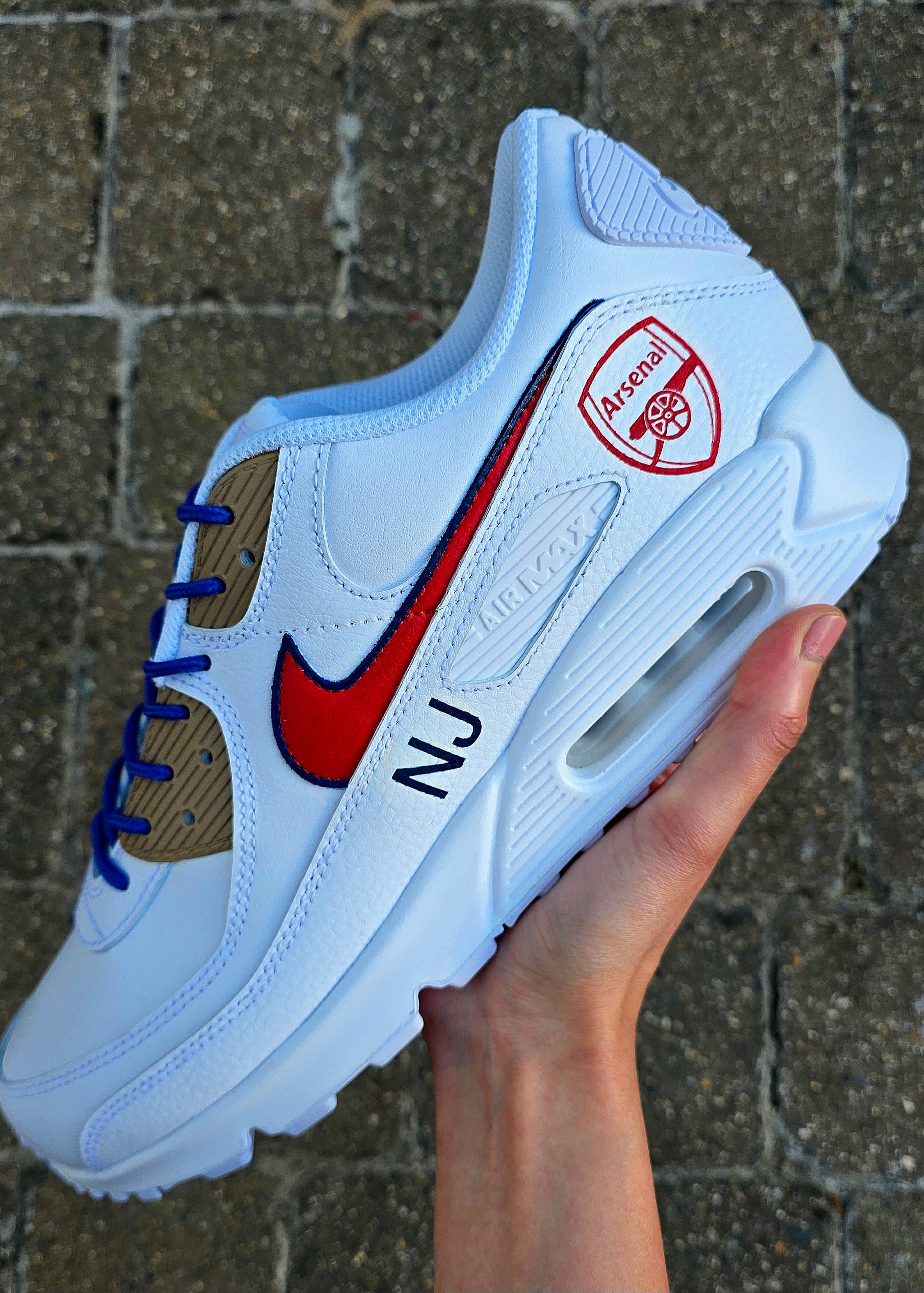 Custom hand-painted Nike Air Max sneakers featuring premium leather construction with intricate football club-themed artwork. Includes vibrant team colors, detailed logos, and personalizable options like initials, numbers, or dates. Waterproof and scratch-resistant for long-lasting wear. Ideal for sports fans, sneaker collectors, and as unique custom gifts. Designed with professional craftsmanship, blending fashion, comfort, and team pride.

