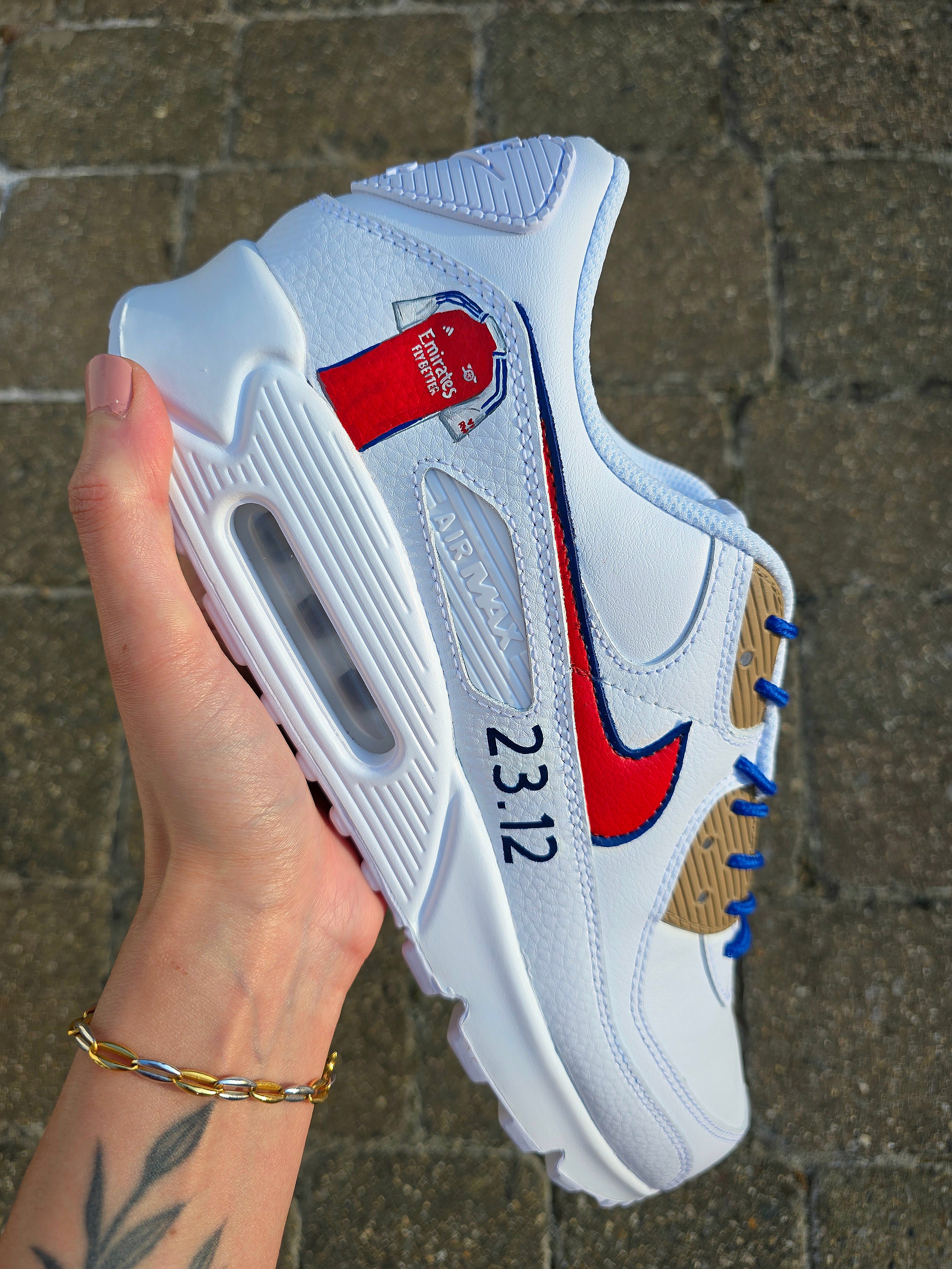 Custom hand-painted Nike Air Max sneakers featuring premium leather construction with intricate football club-themed artwork. Includes vibrant team colors, detailed logos, and personalizable options like initials, numbers, or dates. Waterproof and scratch-resistant for long-lasting wear. Ideal for sports fans, sneaker collectors, and as unique custom gifts. Designed with professional craftsmanship, blending fashion, comfort, and team pride.

