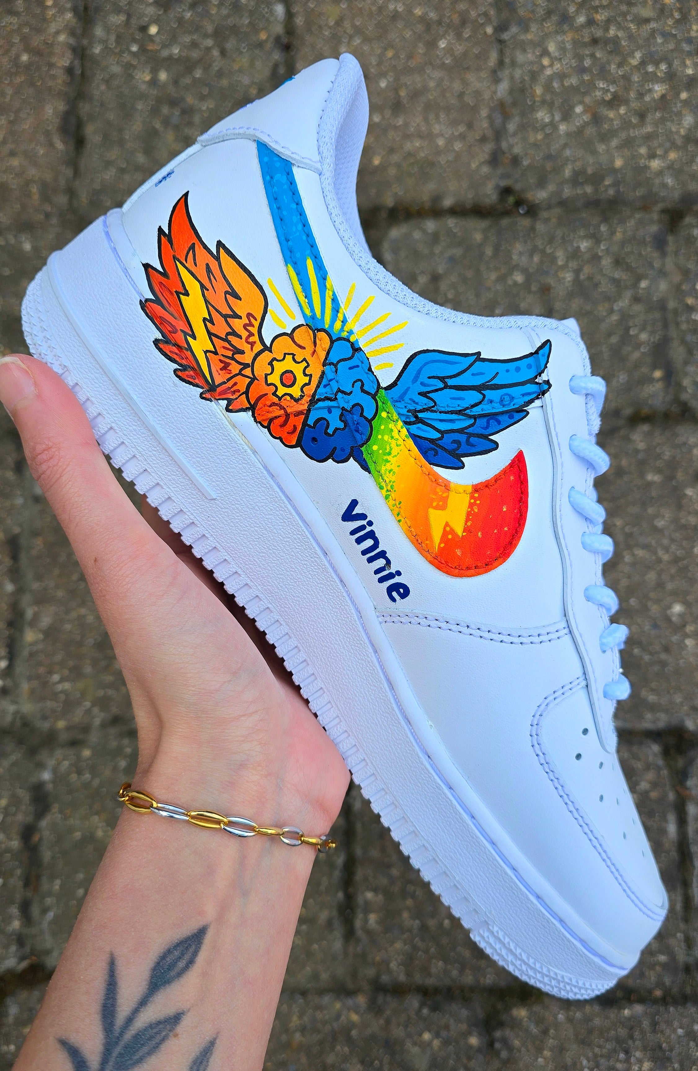 Custom hand-painted Nike Air Force 1 sneakers featuring a vibrant ADHD and Autism awareness design. Includes colourful puzzle pieces, infinity symbols, inspirational typography, and Chelsea FC Foundation branding. Crafted using waterproof and UV-protected leather paints for long-lasting wear. Each pair is unique, representing creativity, inclusivity, and neurodiversity. Perfect for collectors, awareness events, and personal expression.

