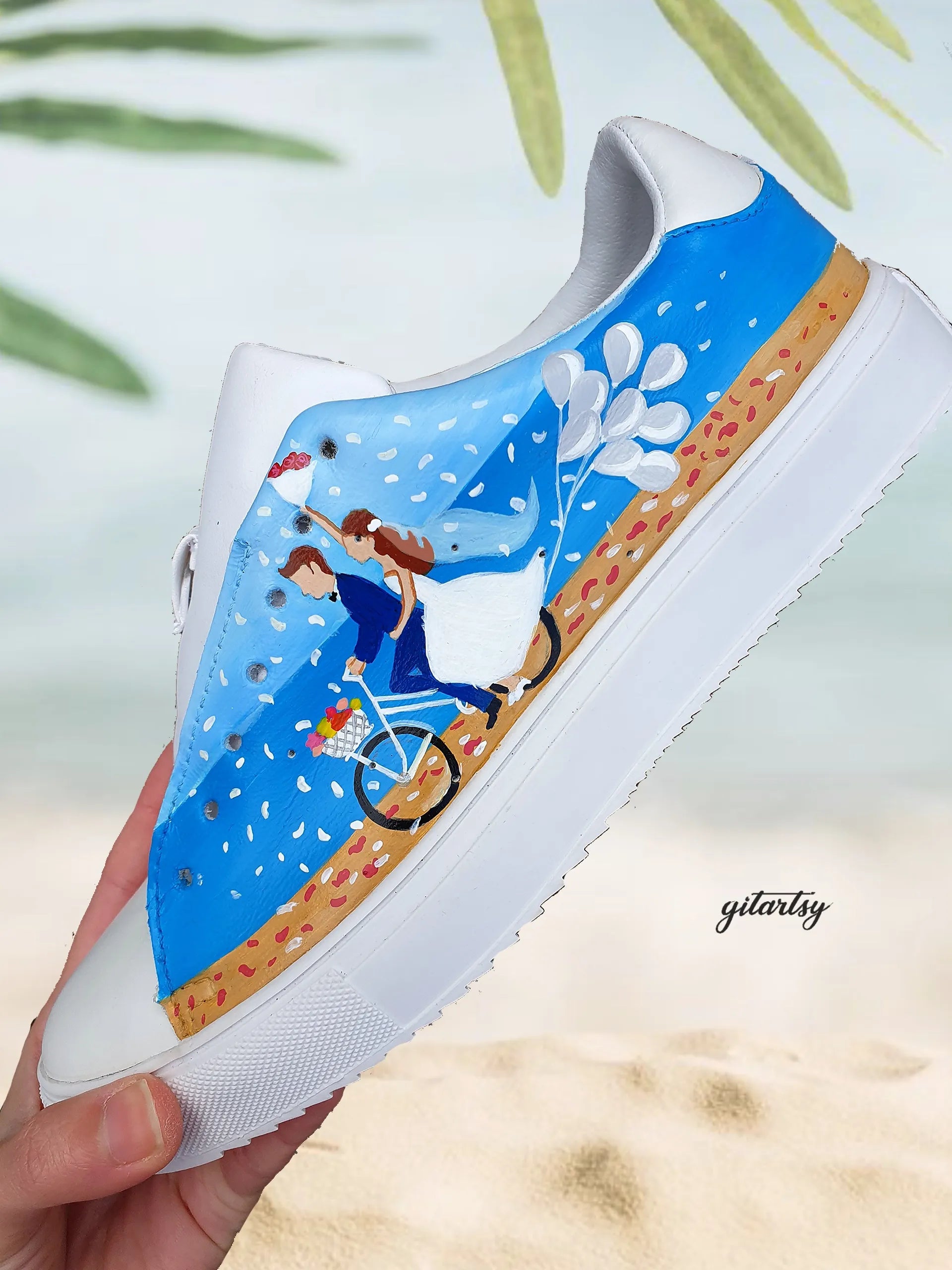 Beach destination wedding sneakers - bride in white dress and groom custom hand painted on white Adidas sneakers