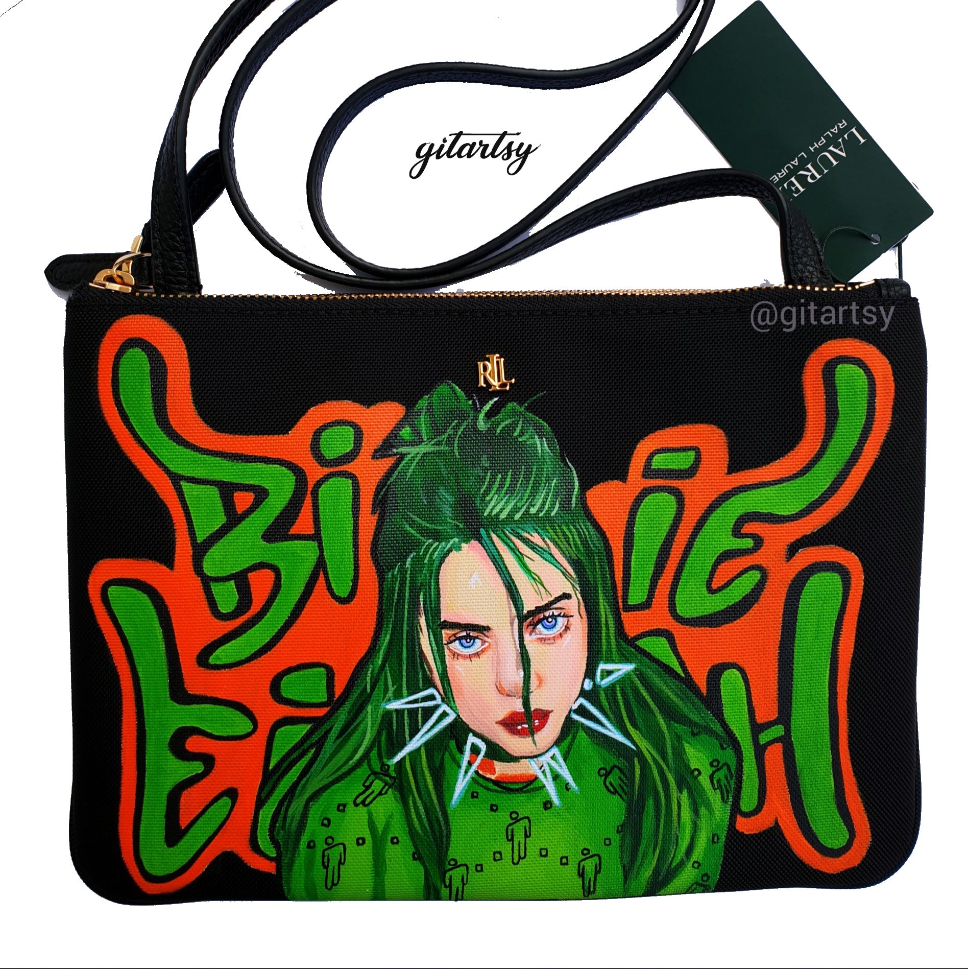 A black Ralph Lauren crossbody canvas bag with a vivid hand-painted portrait of Billie Eilish featuring neon green hair and piercing blue eyes. Surrounding her are graffiti-style green and orange letters spelling “Billie Eilish”. The bag includes a sleek black strap and gold Ralph Lauren logo detailing. High-quality acrylic leather paints are shown in the background alongside a fine detail paintbrush, highlighting the hand-painted craftsmanship.