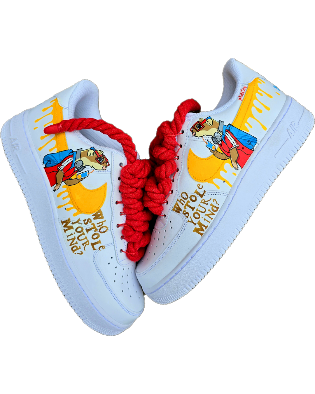 Custom hand-painted Nike Air Force 1 sneakers featuring unique cartoon artwork inspired by the book Who Stole Your Mind? by Being Alphie. The shoes showcase vibrant illustrations, bright yellow swoosh drips, thick red rope laces, and hand-lettered text on premium leather for book lovers, art collectors, and streetwear fans.

