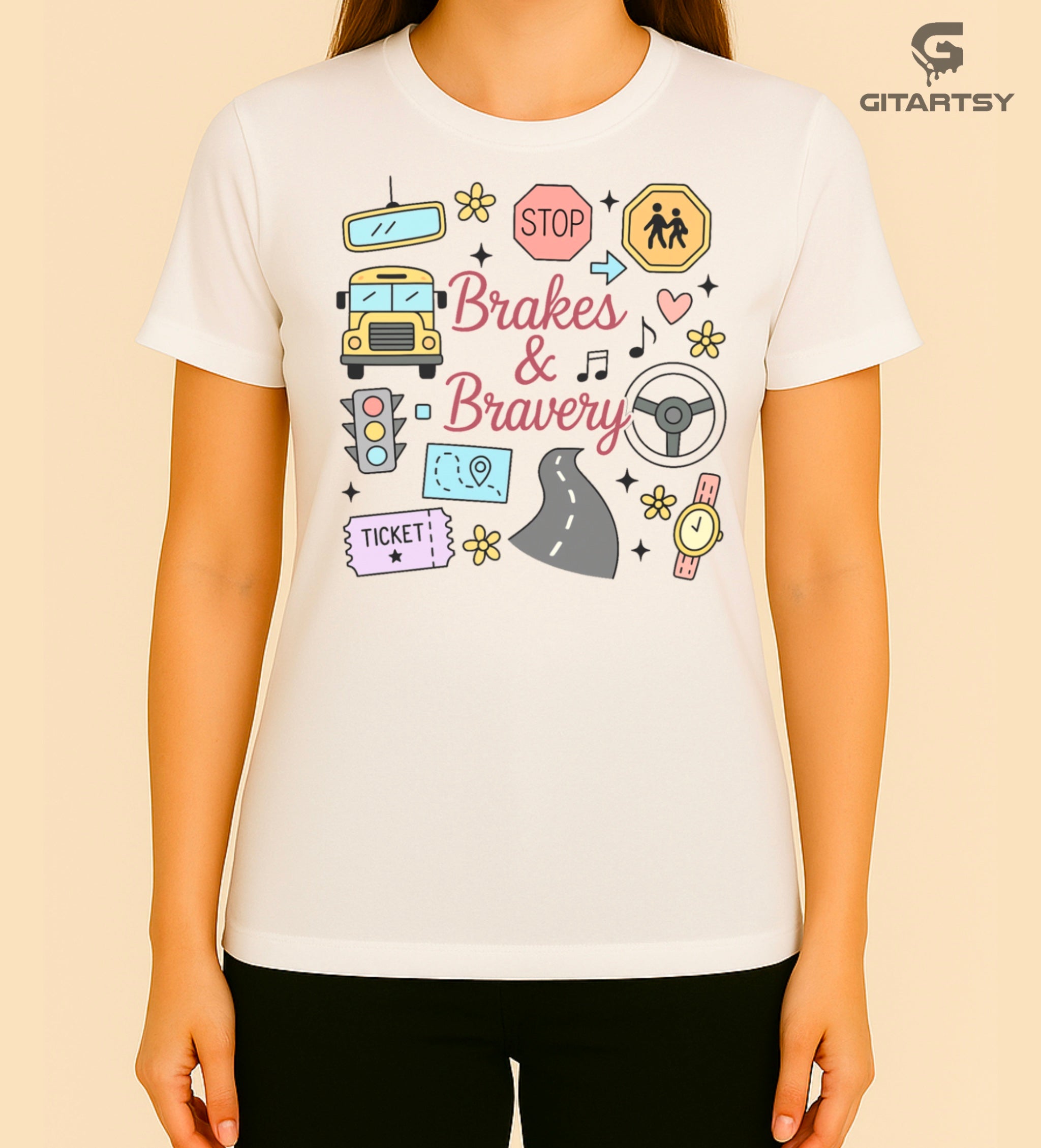 Pastel T-shirt with “Brakes & Bravery” design featuring illustrated school bus, road signs, steering wheel, and driving elements – ideal gift for bus drivers and transport staff