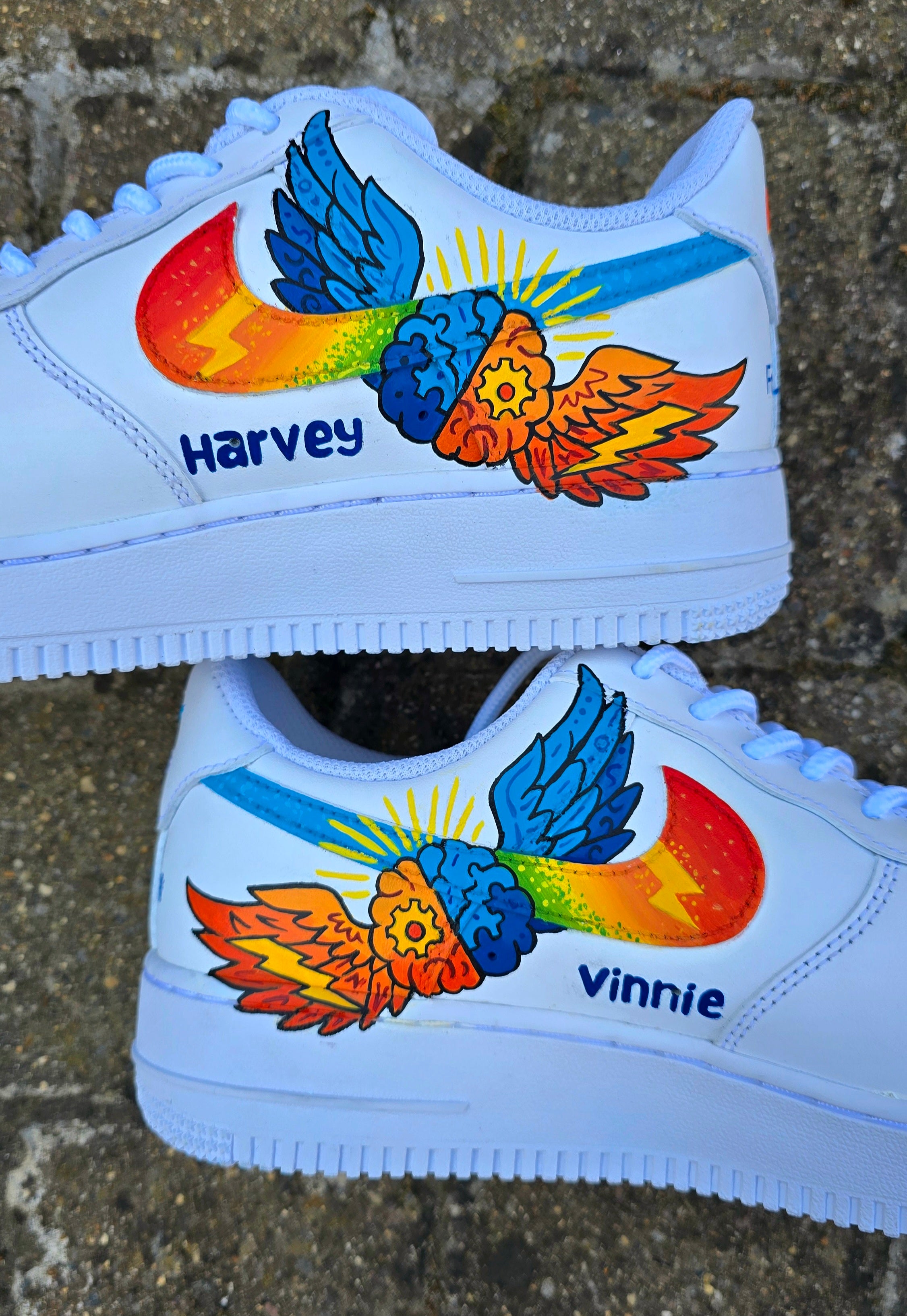 Custom hand-painted Nike Air Force 1 sneakers featuring a vibrant ADHD and Autism awareness design. Includes colourful puzzle pieces, infinity symbols, inspirational typography, and Chelsea FC Foundation branding. Crafted using waterproof and UV-protected leather paints for long-lasting wear. Each pair is unique, representing creativity, inclusivity, and neurodiversity. Perfect for collectors, awareness events, and personal expression.

