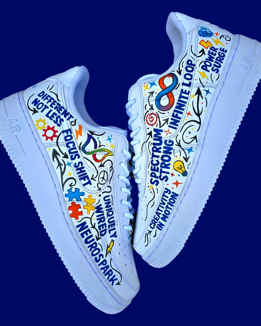 Custom hand-painted Nike Air Force 1 sneakers featuring a vibrant ADHD and Autism awareness design. Includes colourful puzzle pieces, infinity symbols, inspirational typography, and Chelsea FC Foundation branding. Crafted using waterproof and UV-protected leather paints for long-lasting wear. Each pair is unique, representing creativity, inclusivity, and neurodiversity. Perfect for collectors, awareness events, and personal expression.

