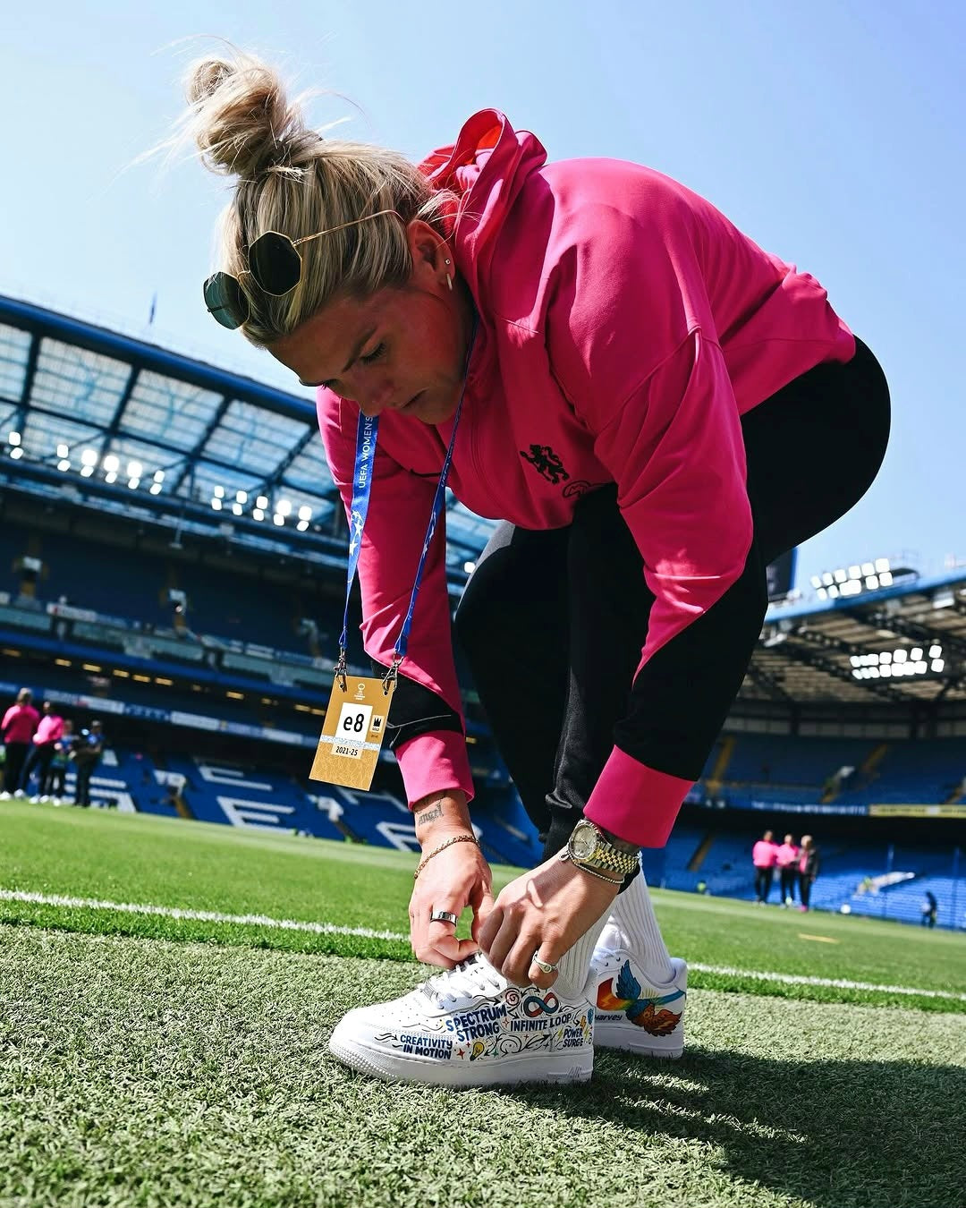 Chelsea footballer and captain Millie Bright - wearing GITARTSY hand painted autism ADHD nike af1 sneakers