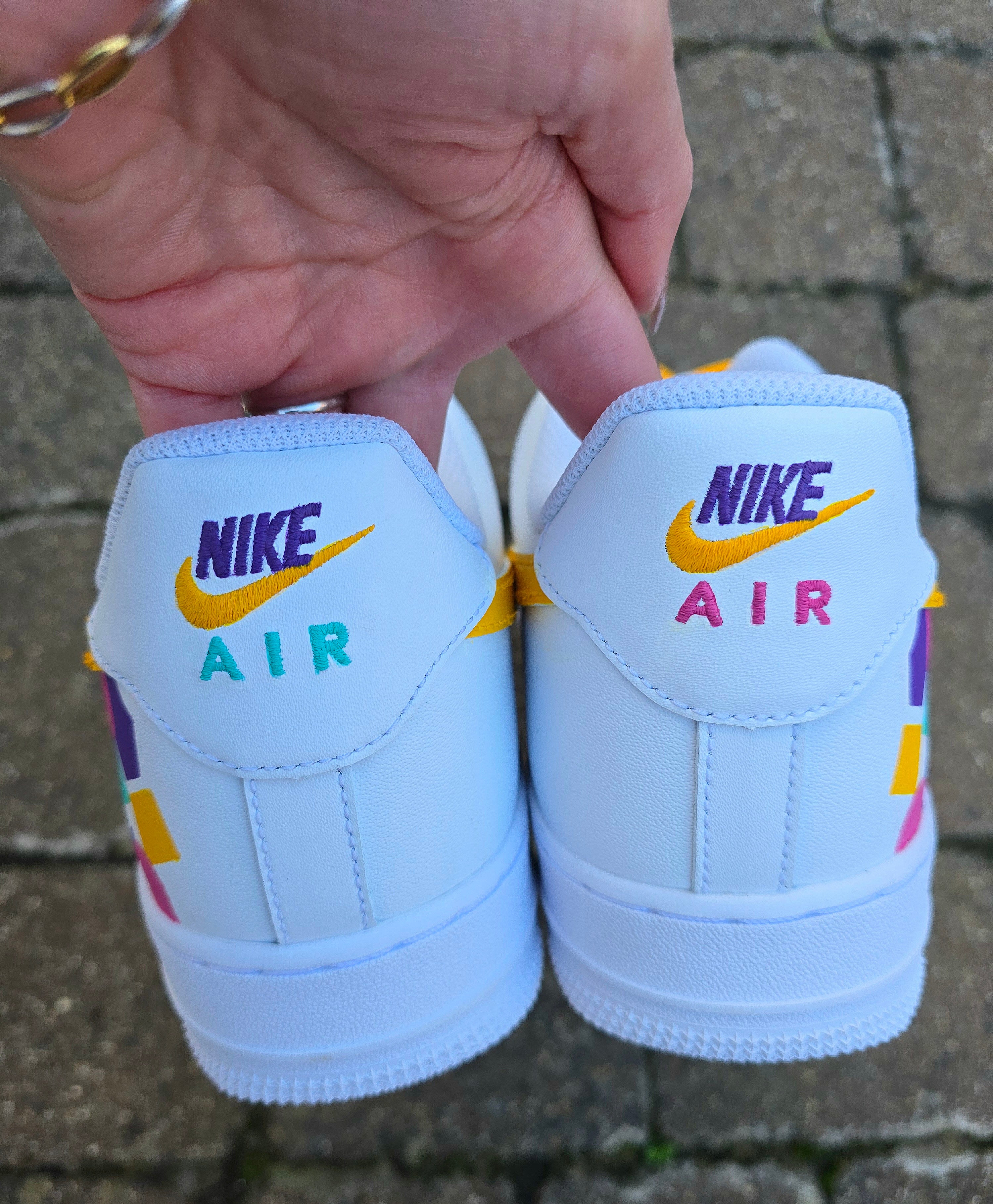 Colourful Nike sneakers with geometric patterns shapes - made for brand - yelllow pink purple green 