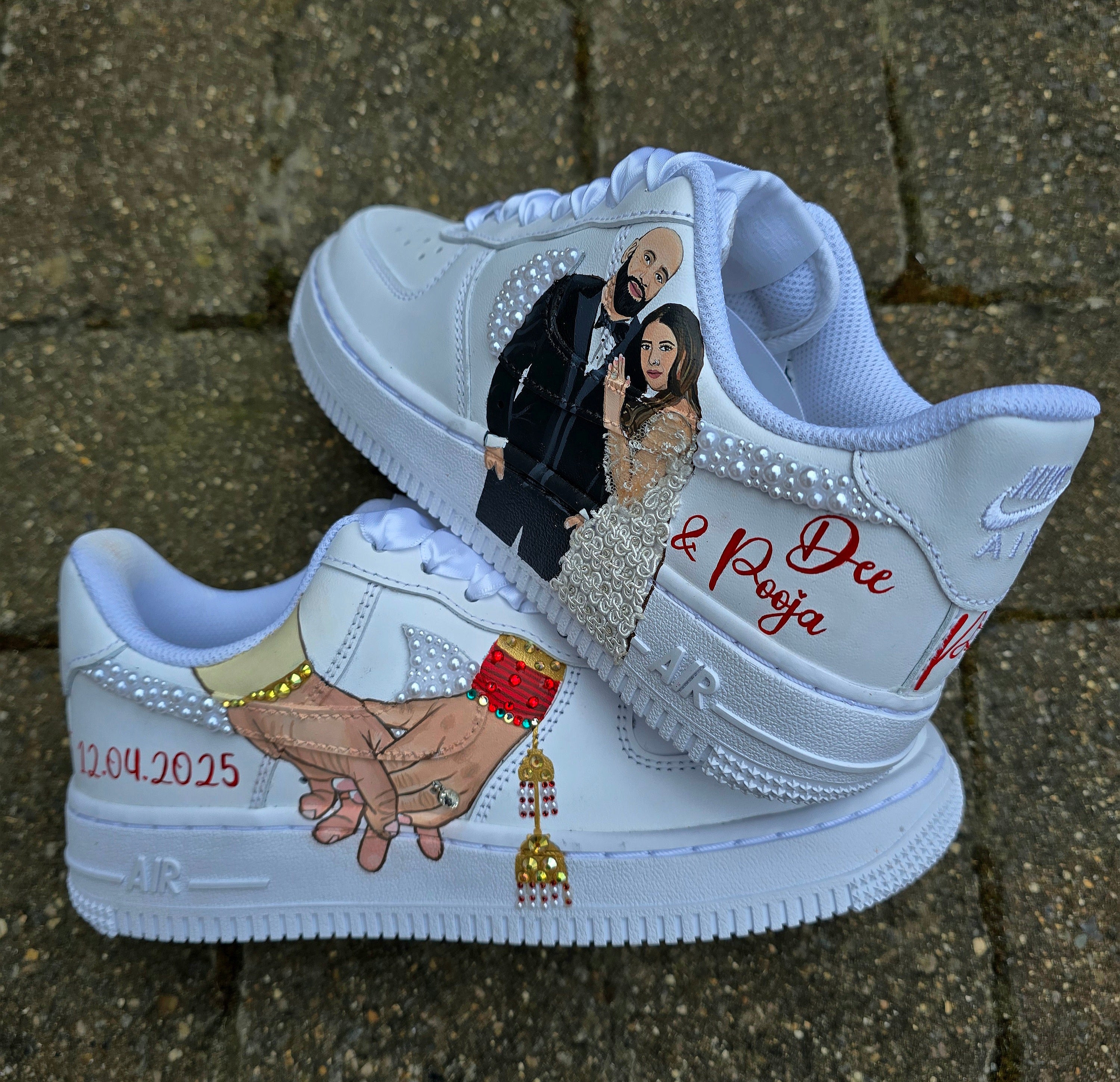 Custom Nike Air Force 1 sneakers hand-painted with a realistic bride and groom portrait, wedding attire details, and personalised touches such as names and dates. Embellished with pearls, rhinestones, and gold accents, these sneakers feature intricate artwork depicting the couple in formal wear and symbolic wedding imagery like clasped hands. Crafted with professional-grade leather paints and sealed for long-lasting wear, these wedding edition shoes combine comfort, style, and sentimental value.

