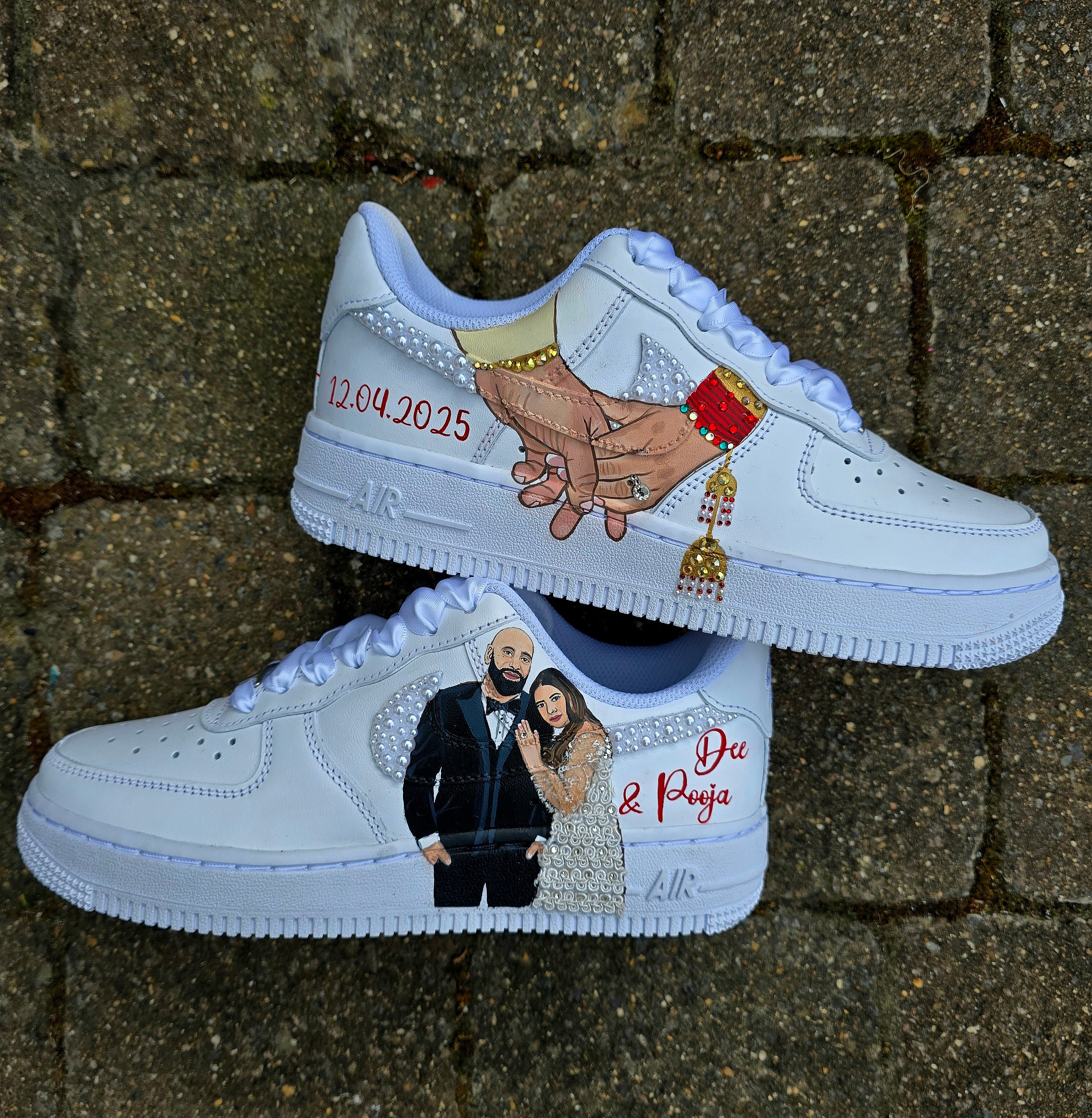 Custom Nike Air Force 1 sneakers hand-painted with a realistic bride and groom portrait, wedding attire details, and personalised touches such as names and dates. Embellished with pearls, rhinestones, and gold accents, these sneakers feature intricate artwork depicting the couple in formal wear and symbolic wedding imagery like clasped hands. Crafted with professional-grade leather paints and sealed for long-lasting wear, these wedding edition shoes combine comfort, style, and sentimental value.

