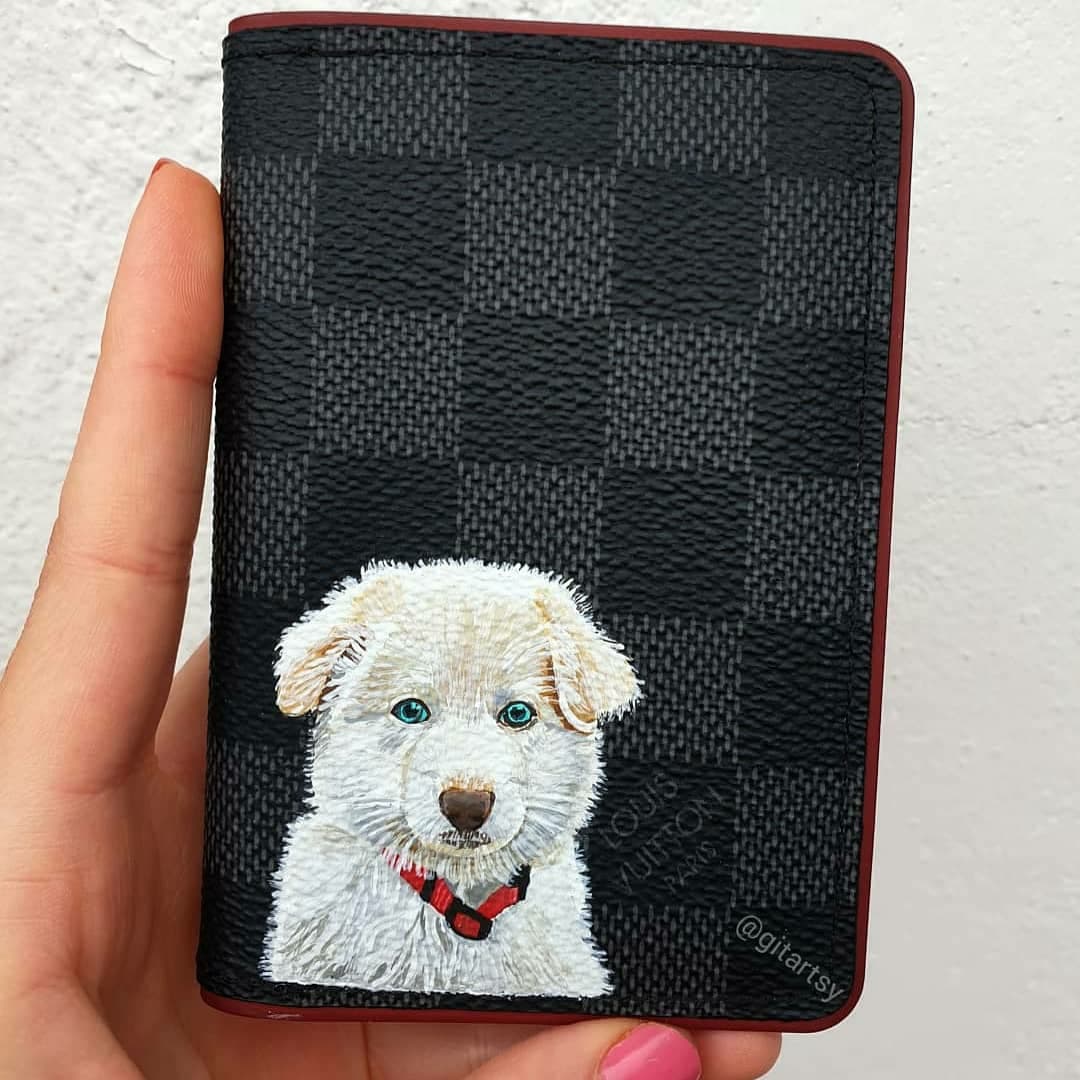 Hand-painted custom dog portrait on an authentic Louis Vuitton wallet or cardholder, featuring a realistic and detailed image of a beloved pet. Unique luxury pet gift idea, showcasing exceptional craftsmanship and personalization for dog lovers who want to carry their furry friend with them everywhere.


