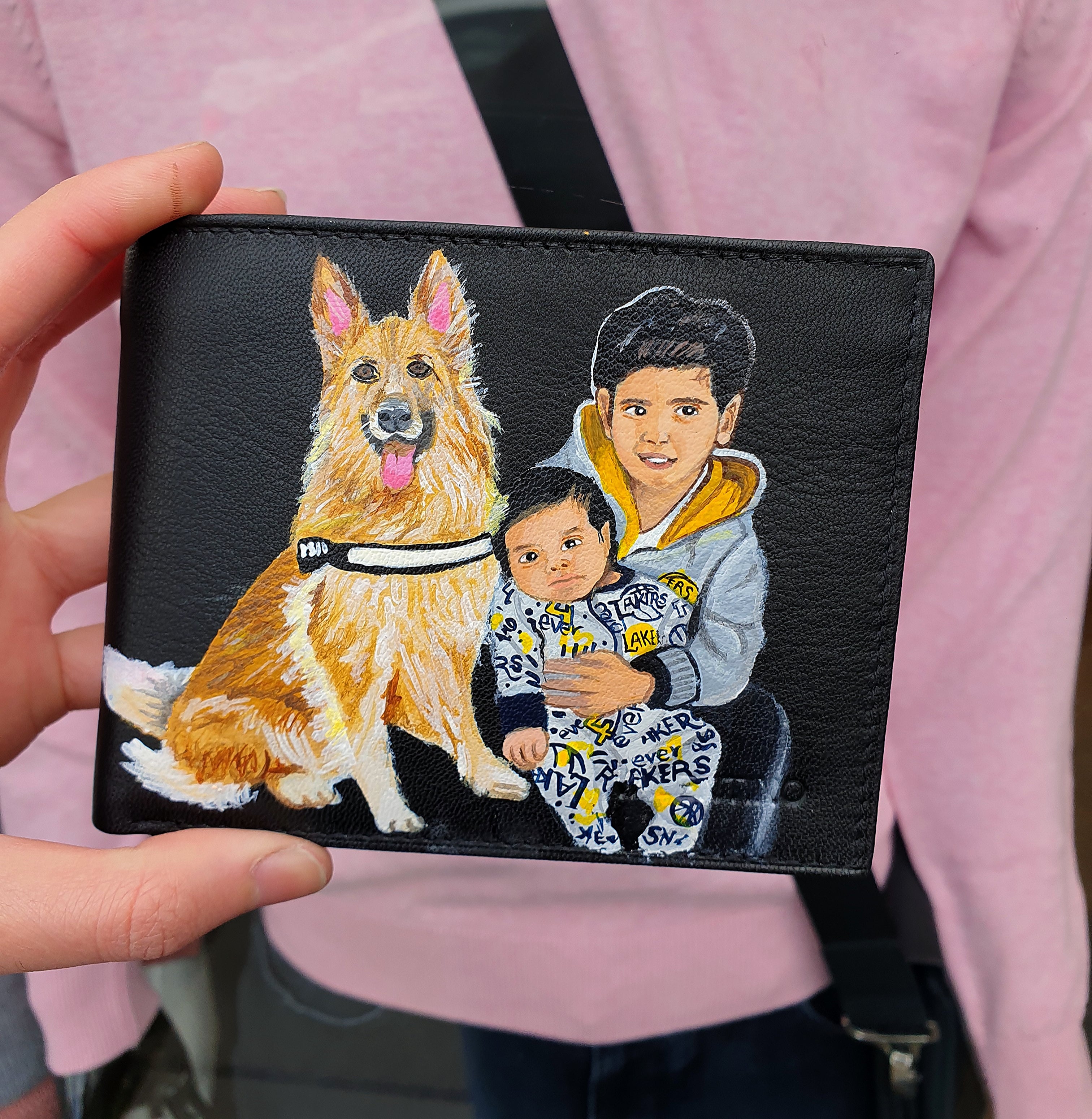 A hand-painted leather wallet featuring a custom portrait of a person, pet, or loved one. The painting is detailed, colourful, and made using premium-quality waterproof leather paints. Ideal for gifting or personal keepsakes, this wallet showcases artistic craftsmanship and premium leatherwork.

