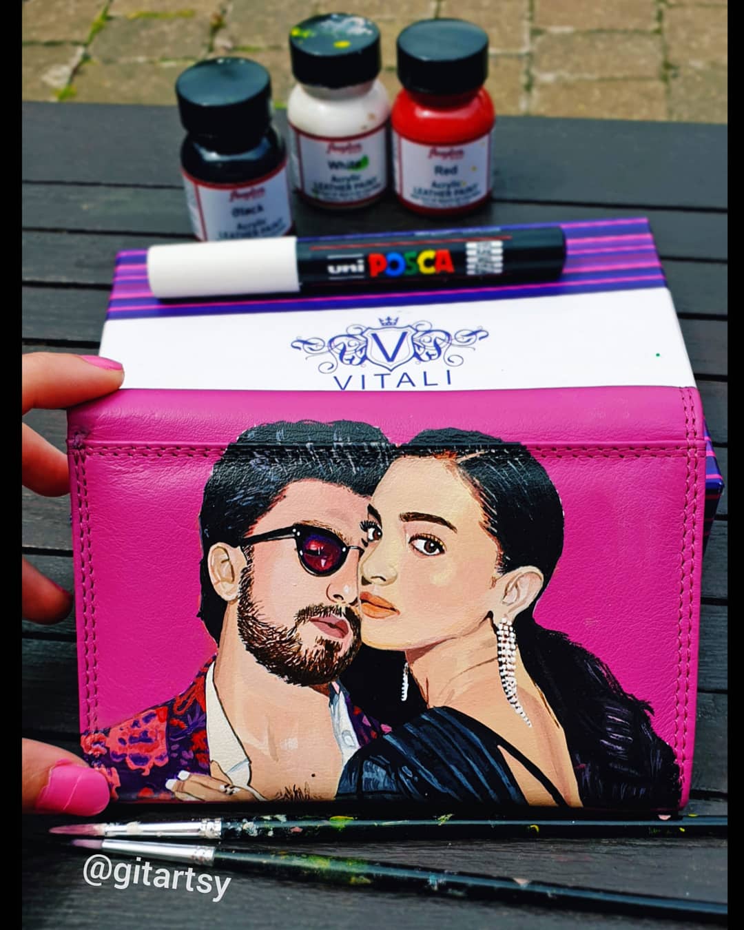 A hand-painted leather wallet featuring a custom portrait of a person, pet, or loved one. The painting is detailed, colourful, and made using premium-quality waterproof leather paints. Ideal for gifting or personal keepsakes, this wallet showcases artistic craftsmanship and premium leatherwork.

