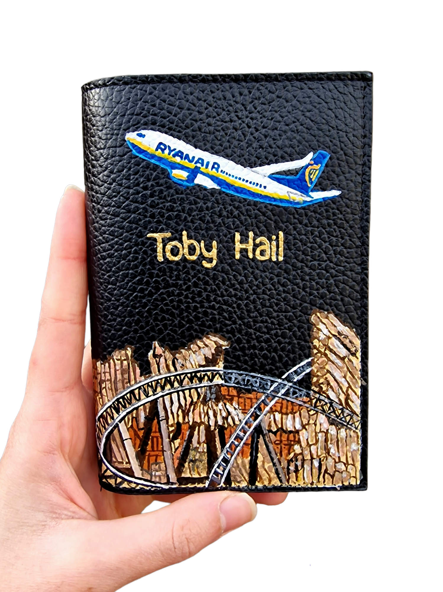 A hand-painted leather wallet featuring a custom portrait of a person, pet, or loved one. The painting is detailed, colourful, and made using premium-quality waterproof leather paints. Ideal for gifting or personal keepsakes, this wallet showcases artistic craftsmanship and premium leatherwork.

