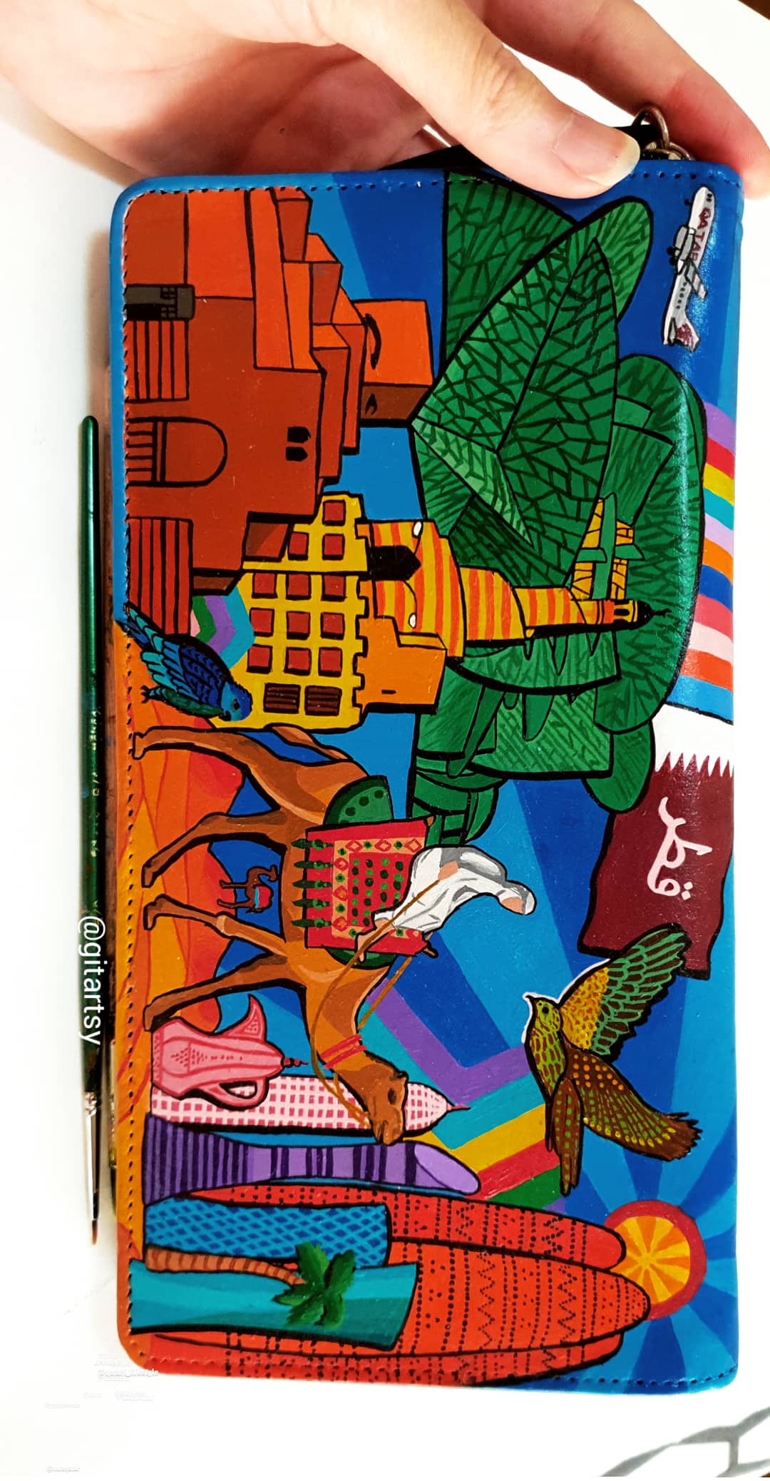 A hand-painted leather wallet featuring a custom portrait of a person, pet, or loved one. The painting is detailed, colourful, and made using premium-quality waterproof leather paints. Ideal for gifting or personal keepsakes, this wallet showcases artistic craftsmanship and premium leatherwork.

