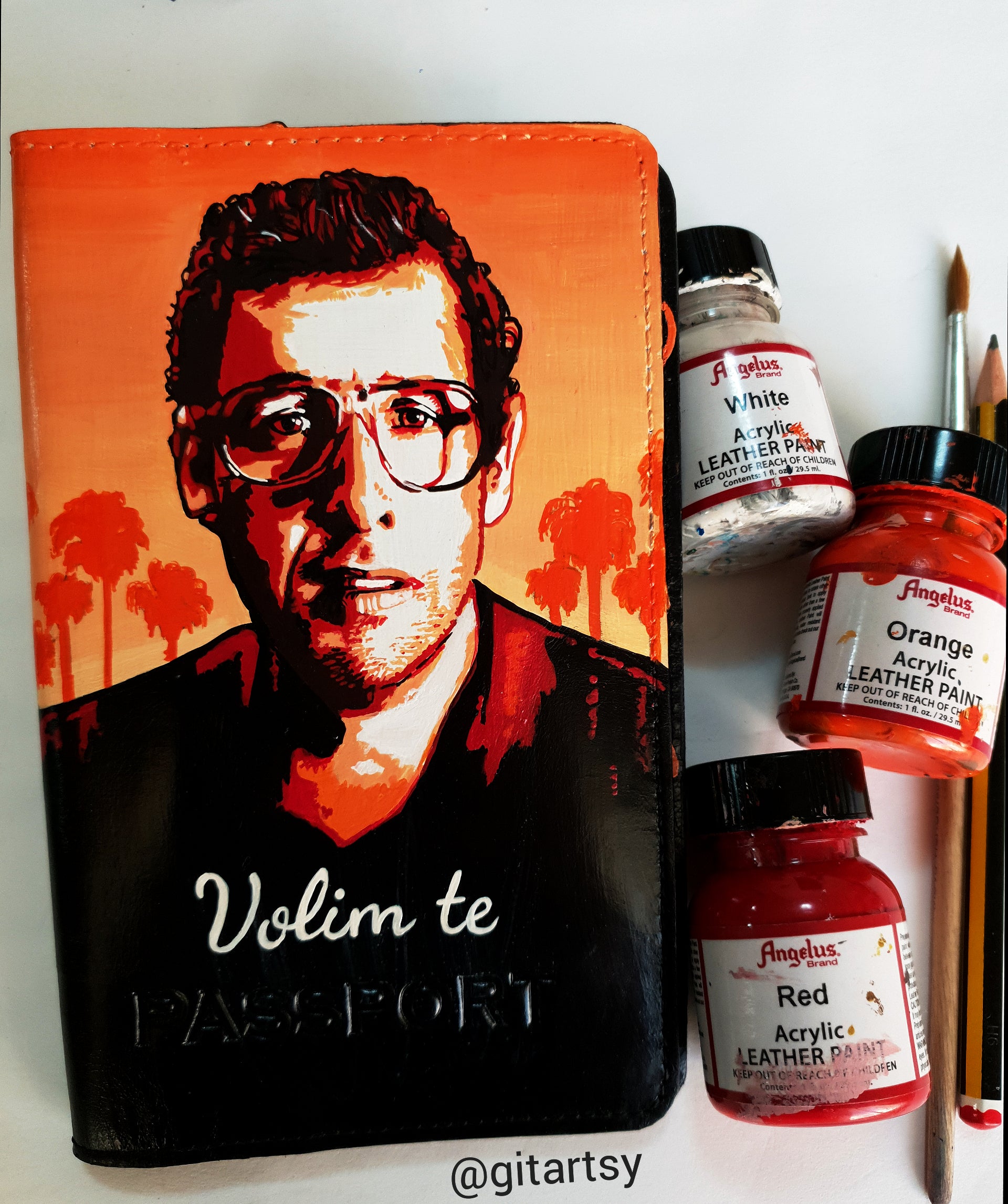 A hand-painted leather wallet featuring a custom portrait of a person, pet, or loved one. The painting is detailed, colourful, and made using premium-quality waterproof leather paints. Ideal for gifting or personal keepsakes, this wallet showcases artistic craftsmanship and premium leatherwork.

