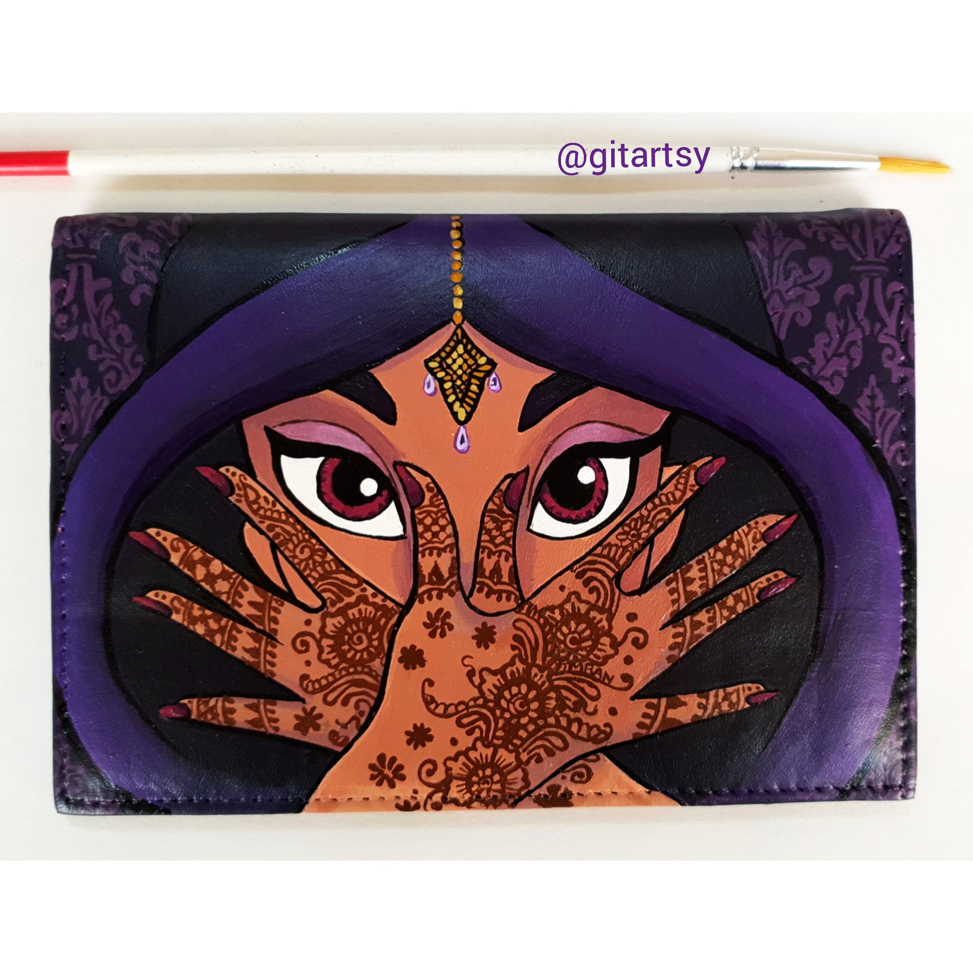 A hand-painted leather wallet featuring a custom portrait of a person, pet, or loved one. The painting is detailed, colourful, and made using premium-quality waterproof leather paints. Ideal for gifting or personal keepsakes, this wallet showcases artistic craftsmanship and premium leatherwork.

