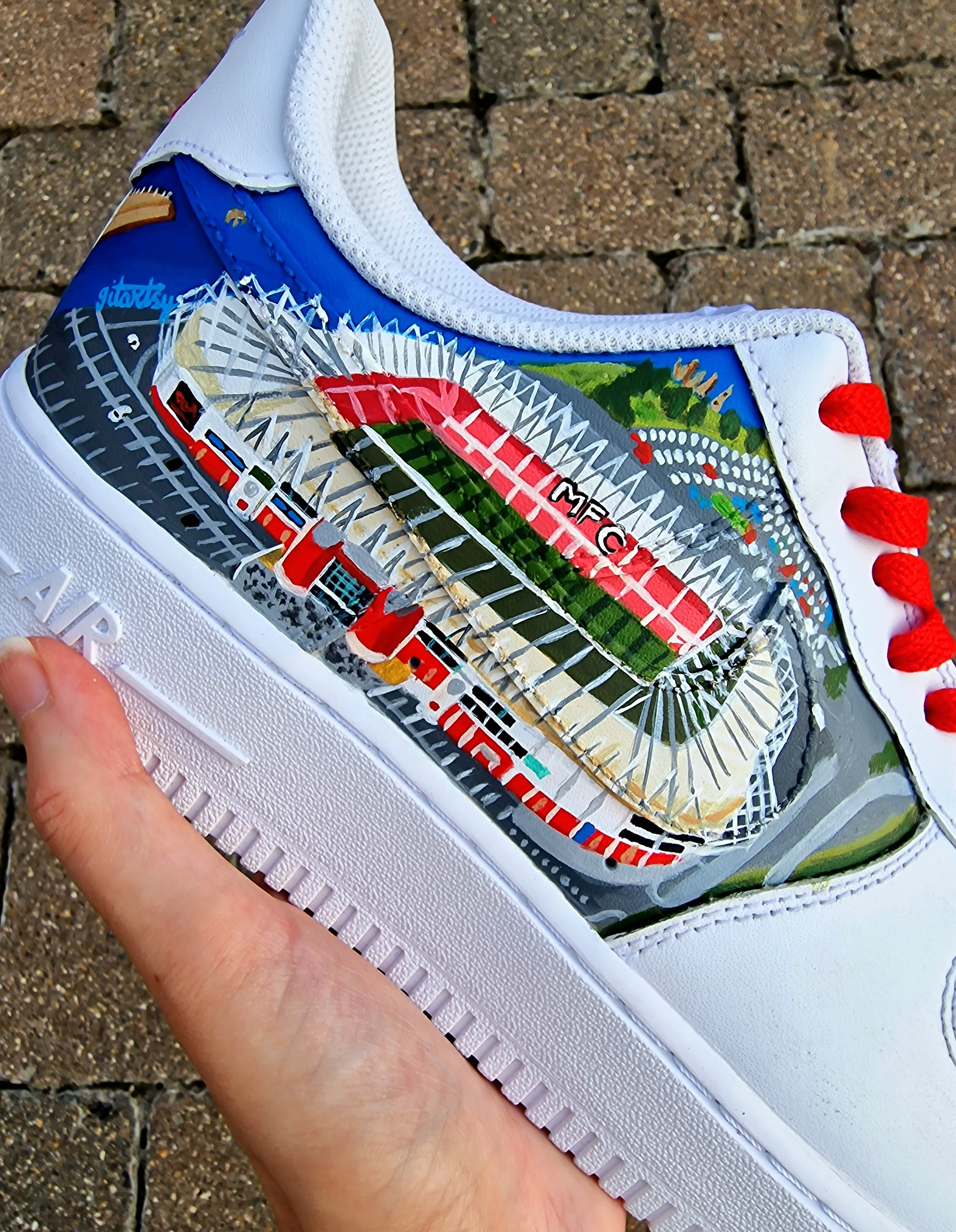 Custom hand-painted sneakers featuring Middlesbrough FC crest, red-and-white checkered pattern with stud embellishments, and detailed Riverside Stadium artwork. White base sneakers with red laces, designed by Gitartsy for football fans, sneaker collectors, and Boro supporters.

