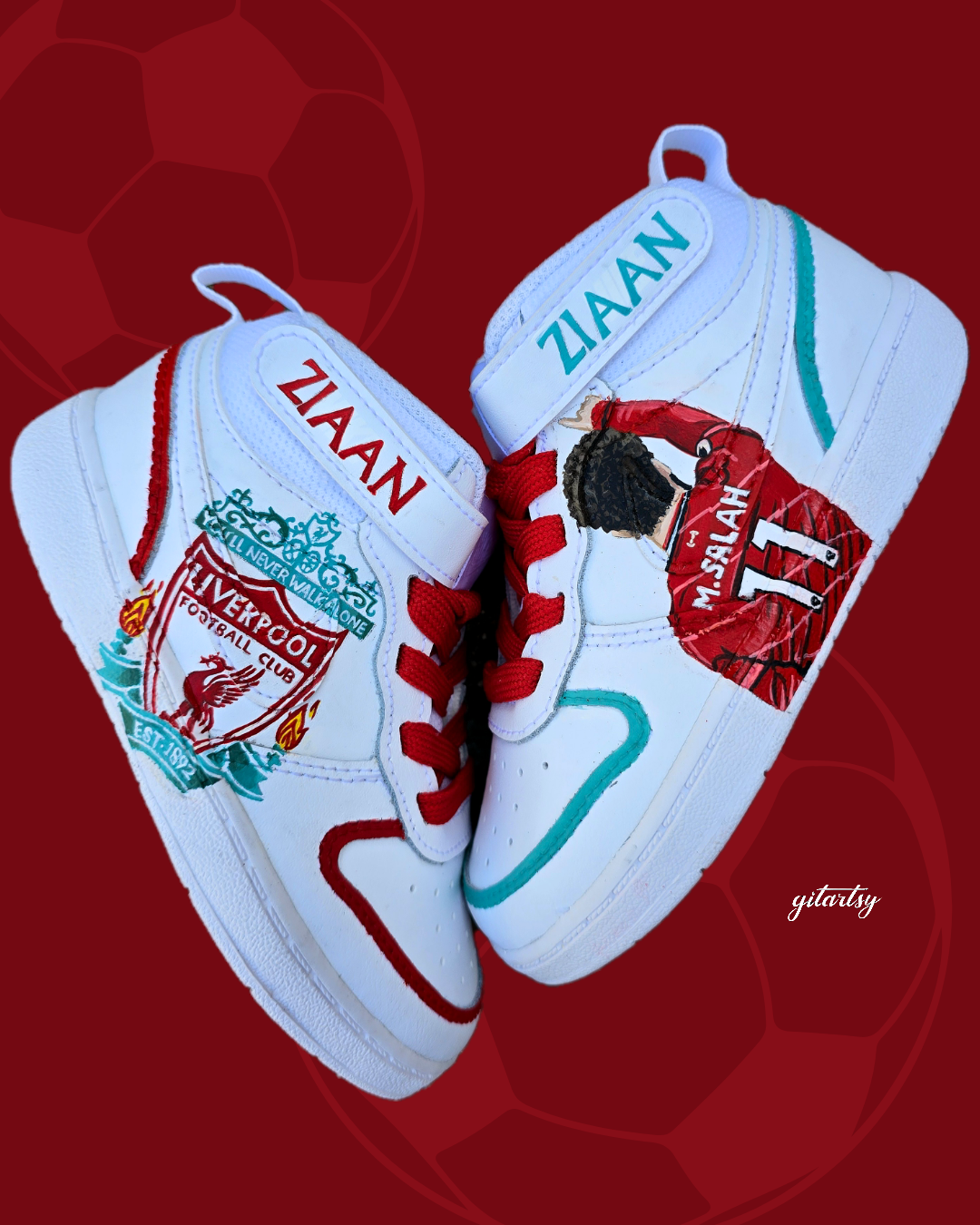 Hand-painted custom baby sneakers featuring a Liverpool FC theme with Mo Salah portrait and club crest. Personalized toddler shoes with red and teal accents, bright red laces, and your child’s name on the Velcro strap. Unique wearable artwork by Gitartsy.

