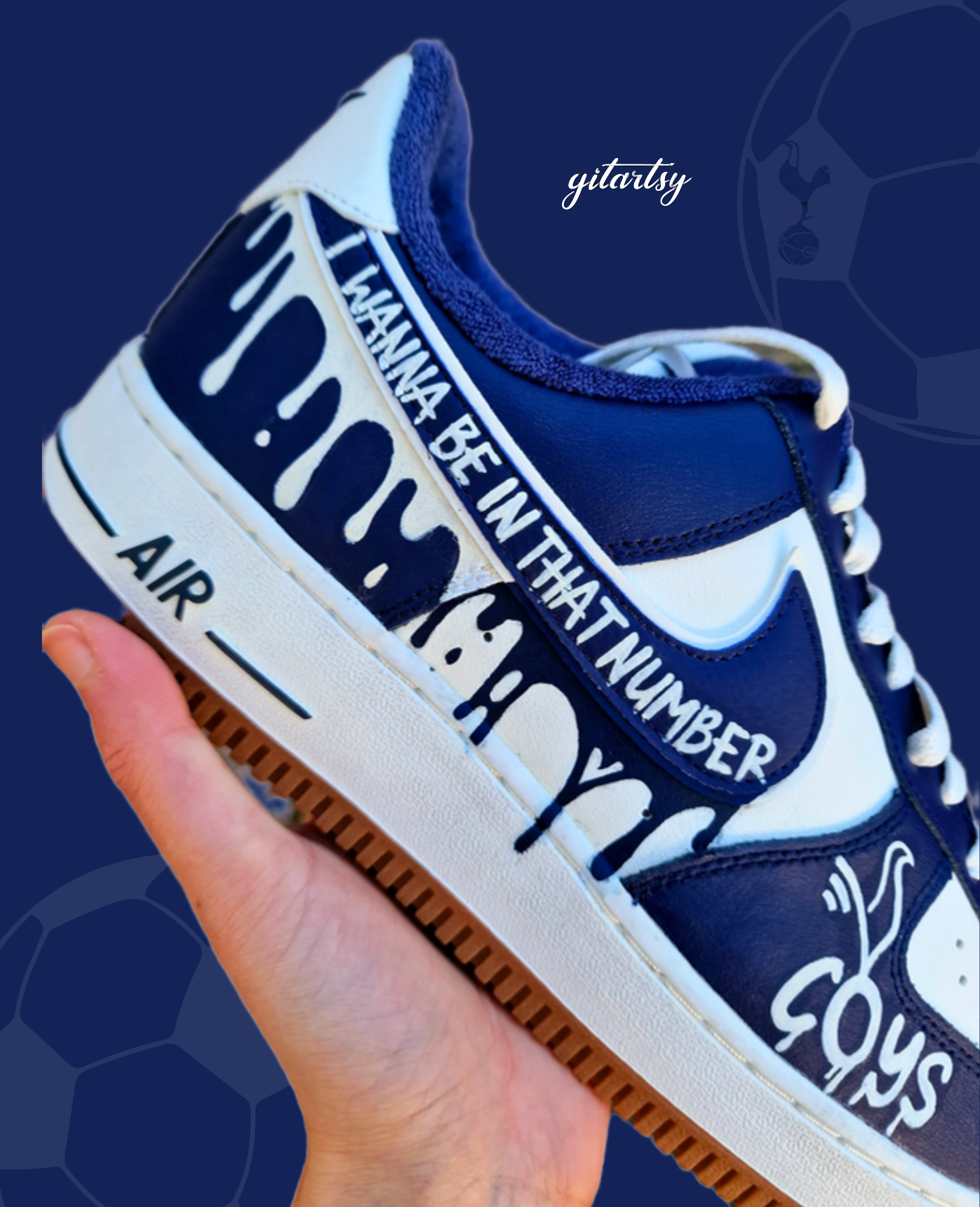 Custom hand-painted Nike Air Force 1 sneakers in navy and white featuring Tottenham Hotspur-inspired artwork, paint drip design, and fan chants including “COYS”, “The Pride of North of London”, “I Wanna Be In That Number”, and “Est. 1882”, created by Gitartsy with premium leather paint and sealing for durability and vibrancy.


