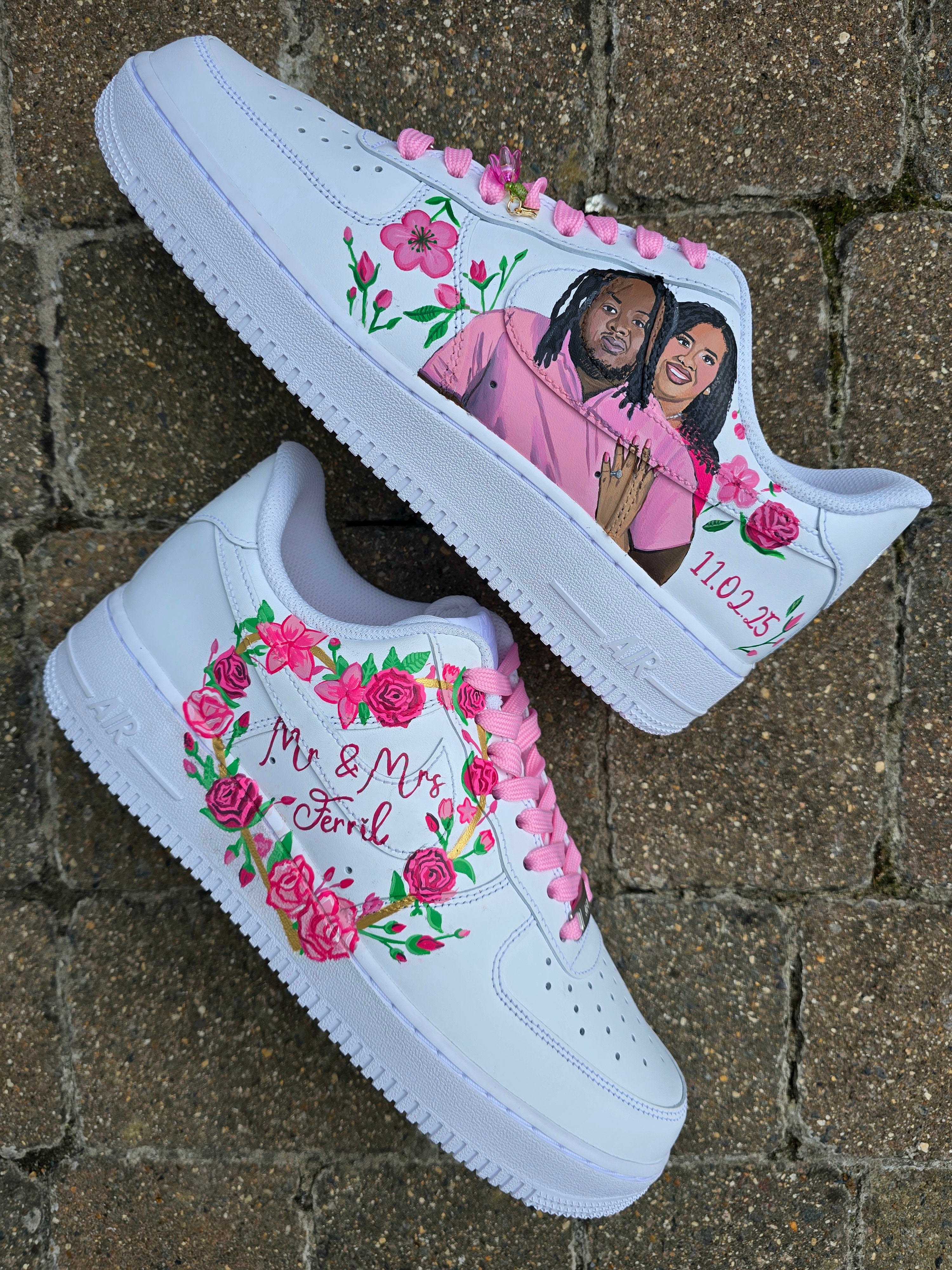 Hand-painted custom Nike Air Force 1 wedding sneakers featuring "Mr. & Mrs." text, pink floral artwork, optional bride and groom portrait, and romantic personalized detailing; ideal for weddings, anniversaries, and bridal events; white AF1 base with pink laces and custom florals.

