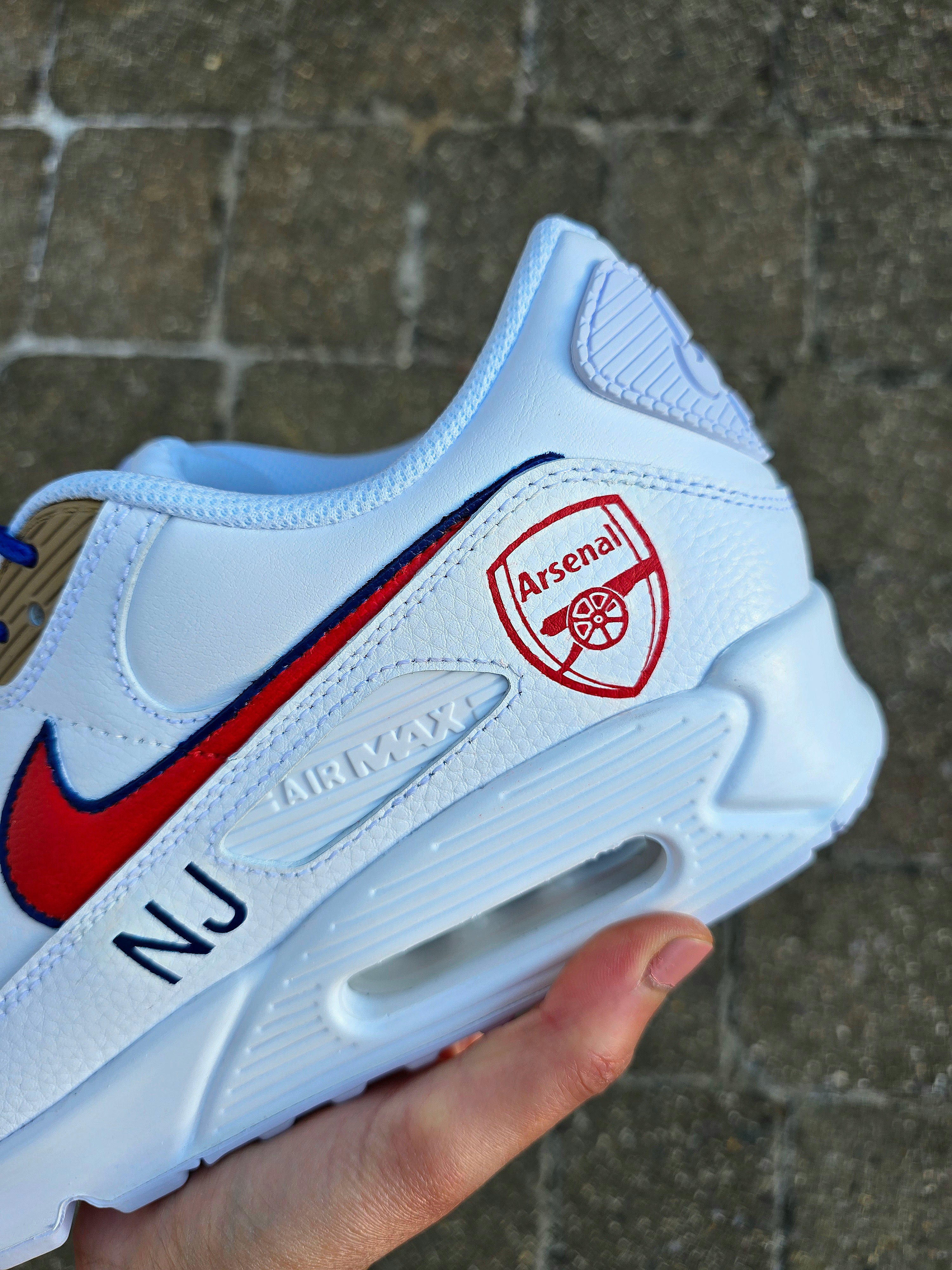 Custom hand-painted Nike Air Max sneakers featuring premium leather construction with intricate football club-themed artwork. Includes vibrant team colors, detailed logos, and personalizable options like initials, numbers, or dates. Waterproof and scratch-resistant for long-lasting wear. Ideal for sports fans, sneaker collectors, and as unique custom gifts. Designed with professional craftsmanship, blending fashion, comfort, and team pride.

