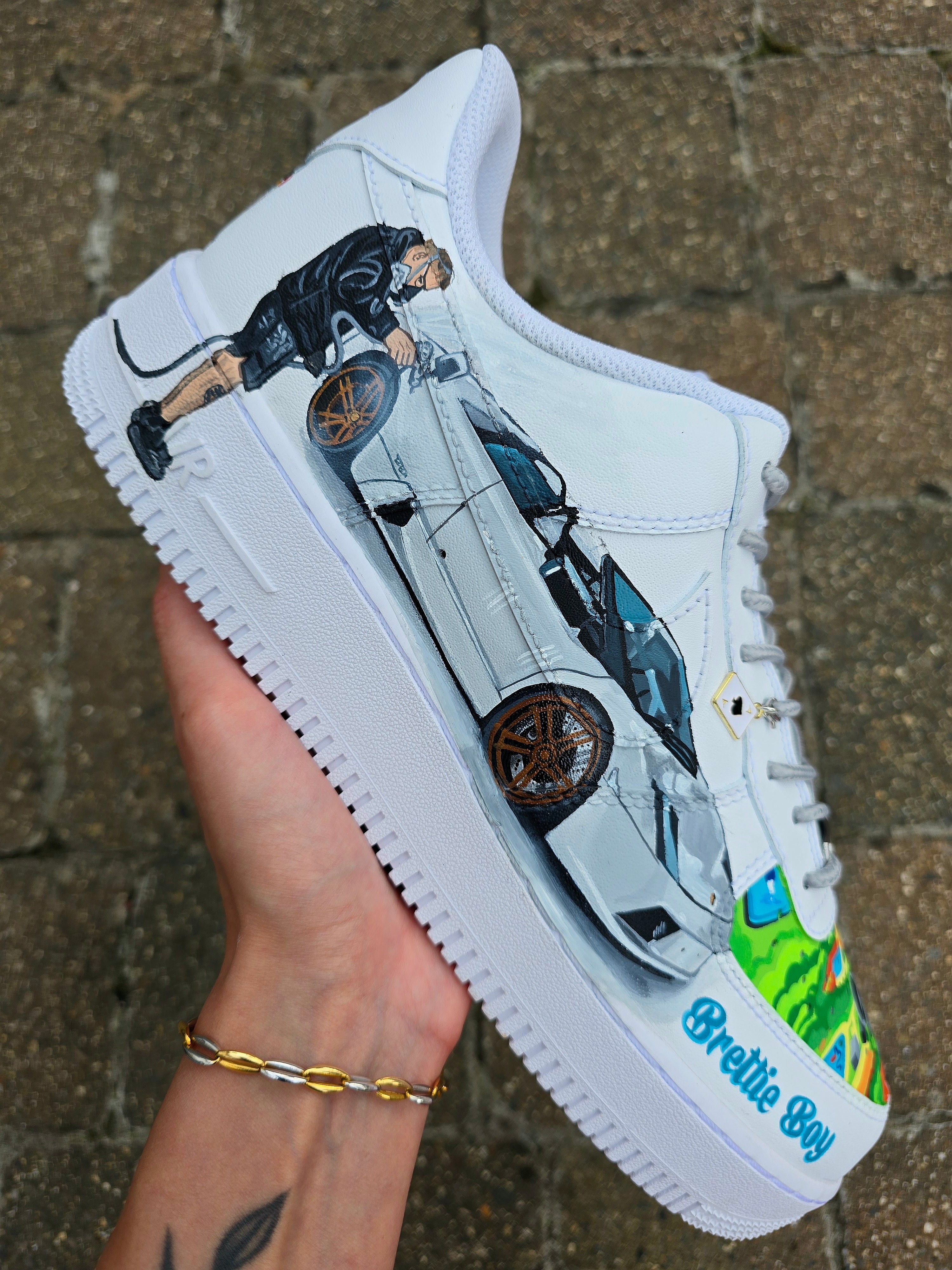 Custom hand-painted Nike Air Force 1 sneakers featuring a Lamborghini-inspired design 🏎️ and spray painter artwork 🎨. Created by Gitartsy using premium leather paints, sealed for durability, and fully customisable with personal details such as car models, colors, and text. Perfect for car enthusiasts 🚗, sneaker collectors 👟, and streetwear lovers seeking one-of-a-kind footwear.

