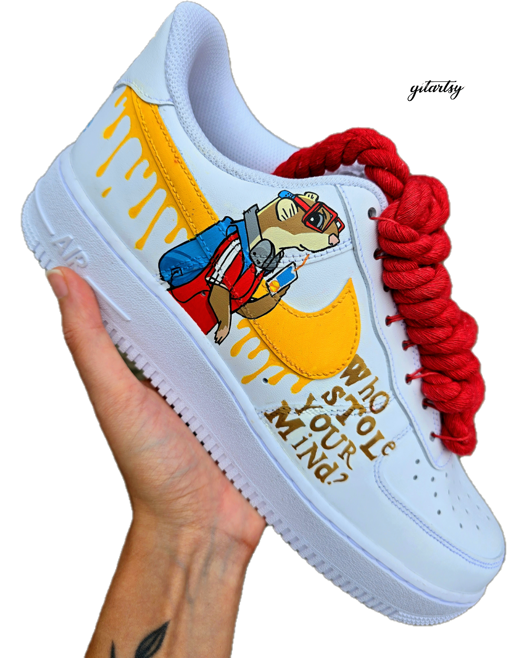 Custom hand-painted Nike Air Force 1 sneakers featuring unique cartoon artwork inspired by the book Who Stole Your Mind? by Being Alphie. The shoes showcase vibrant illustrations, bright yellow swoosh drips, thick red rope laces, and hand-lettered text on premium leather for book lovers, art collectors, and streetwear fans.

