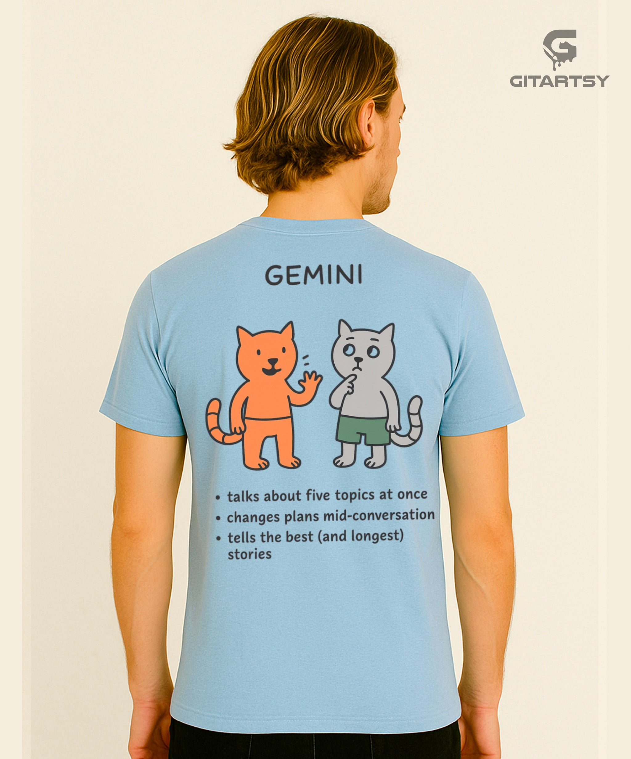 Gemini Zodiac Sign T-Shirt – Funny, Cute & Minimal Streetwear Tee (Unisex) - illustrated with 2 cats talking to each other and the words read: talks a lot, changes plans, tells best stories - blue