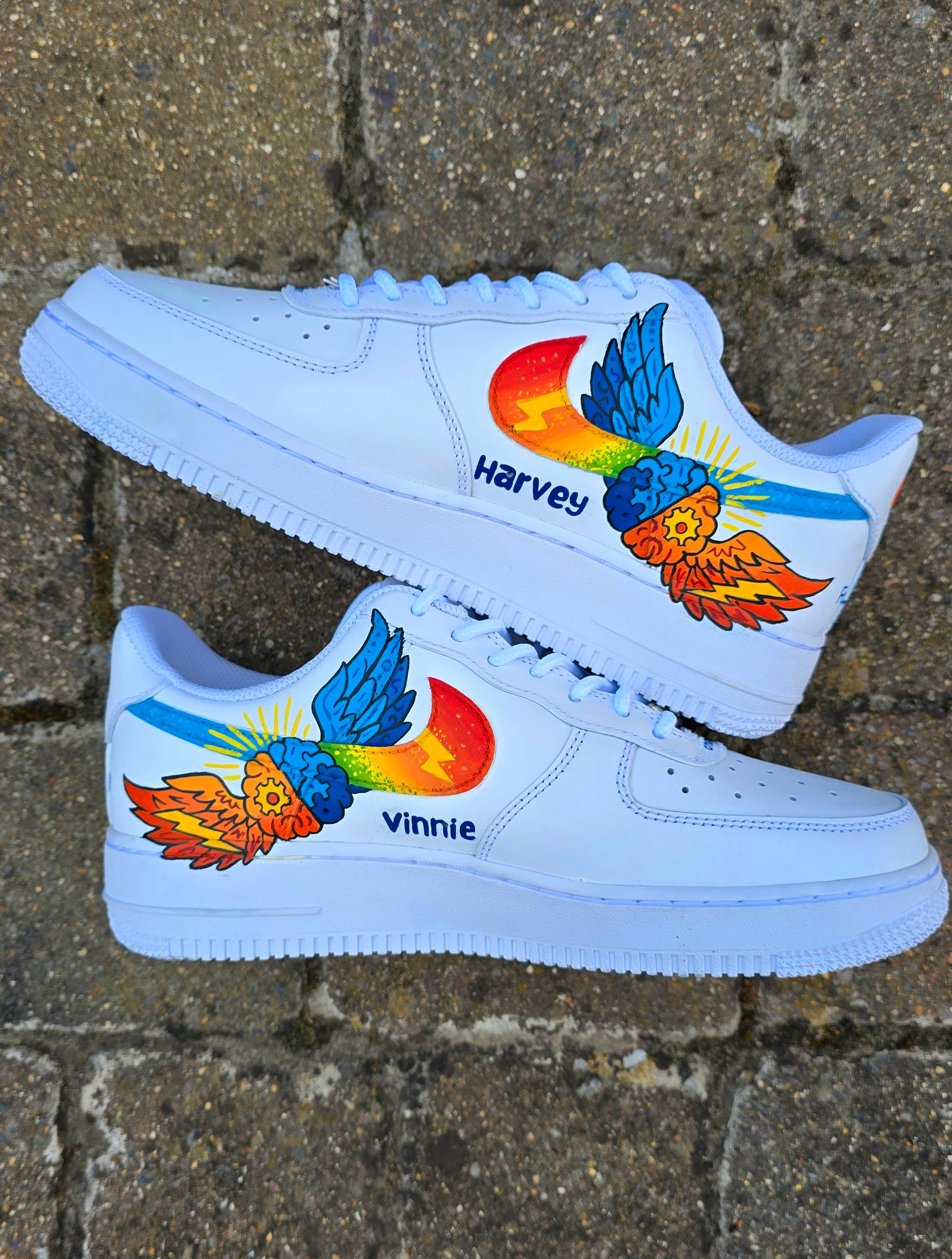 Custom hand-painted Nike Air Force 1 sneakers featuring a vibrant ADHD and Autism awareness design. Includes colourful puzzle pieces, infinity symbols, inspirational typography, and Chelsea FC Foundation branding. Crafted using waterproof and UV-protected leather paints for long-lasting wear. Each pair is unique, representing creativity, inclusivity, and neurodiversity. Perfect for collectors, awareness events, and personal expression.

