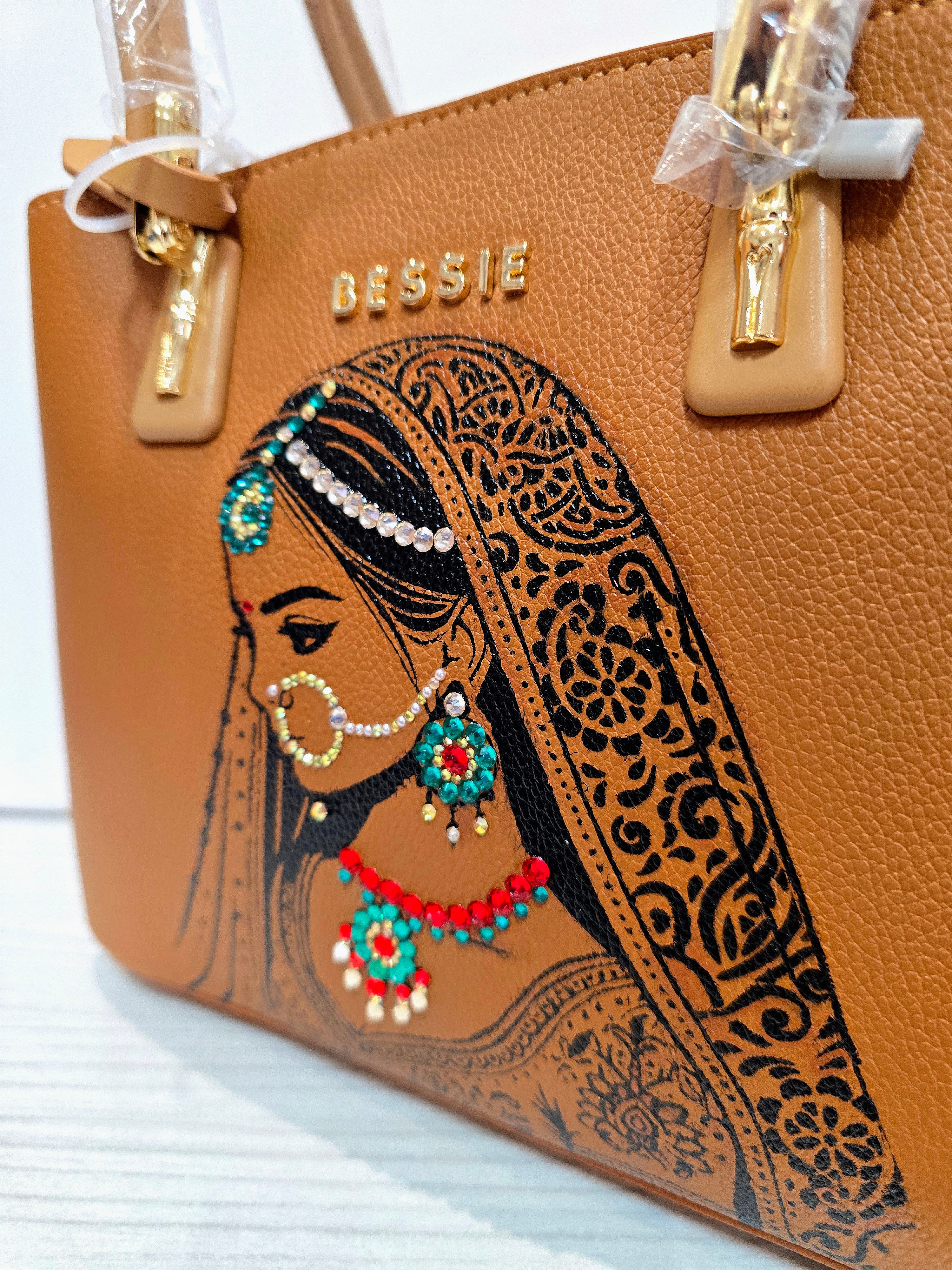 Hand painted bessie London tan brown bag with indian bride illustration and shiny crsystals and rhinestones on the jewellery 