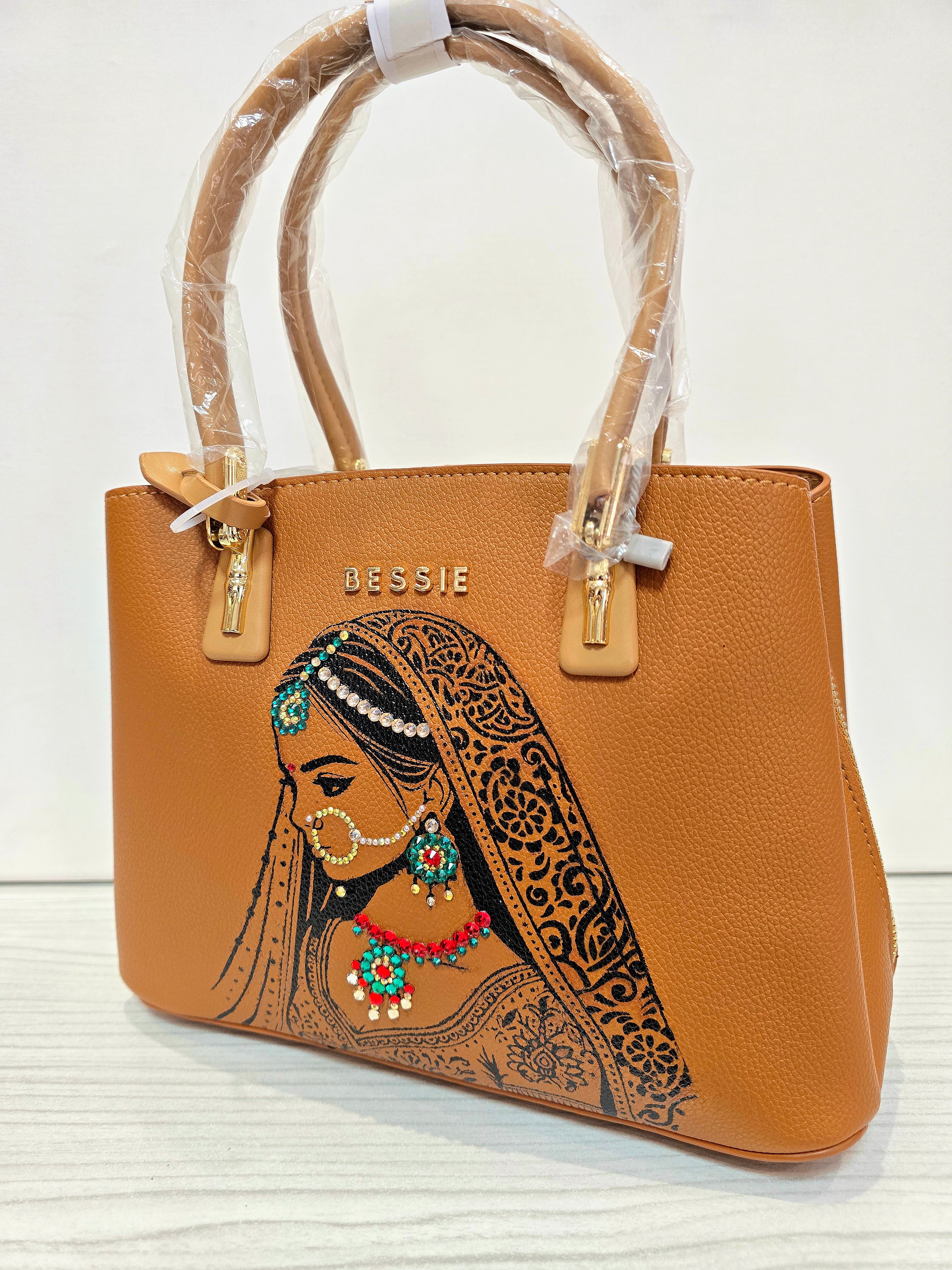 Hand painted bessie London tan brown bag with indian bride illustration and shiny crsystals and rhinestones on the jewellery 