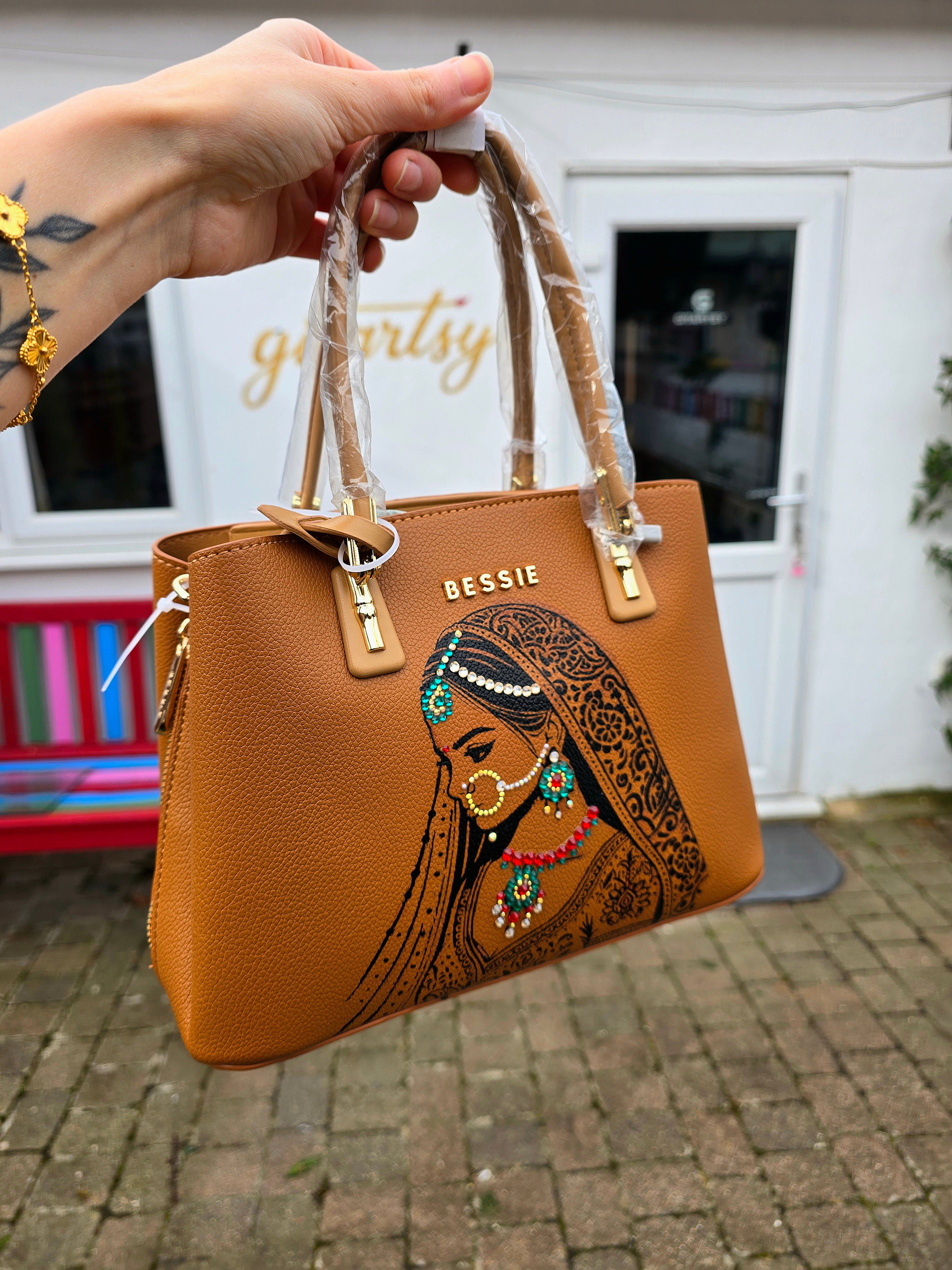 Hand painted bessie London tan brown bag with indian bride illustration and shiny crsystals and rhinestones on the jewellery 