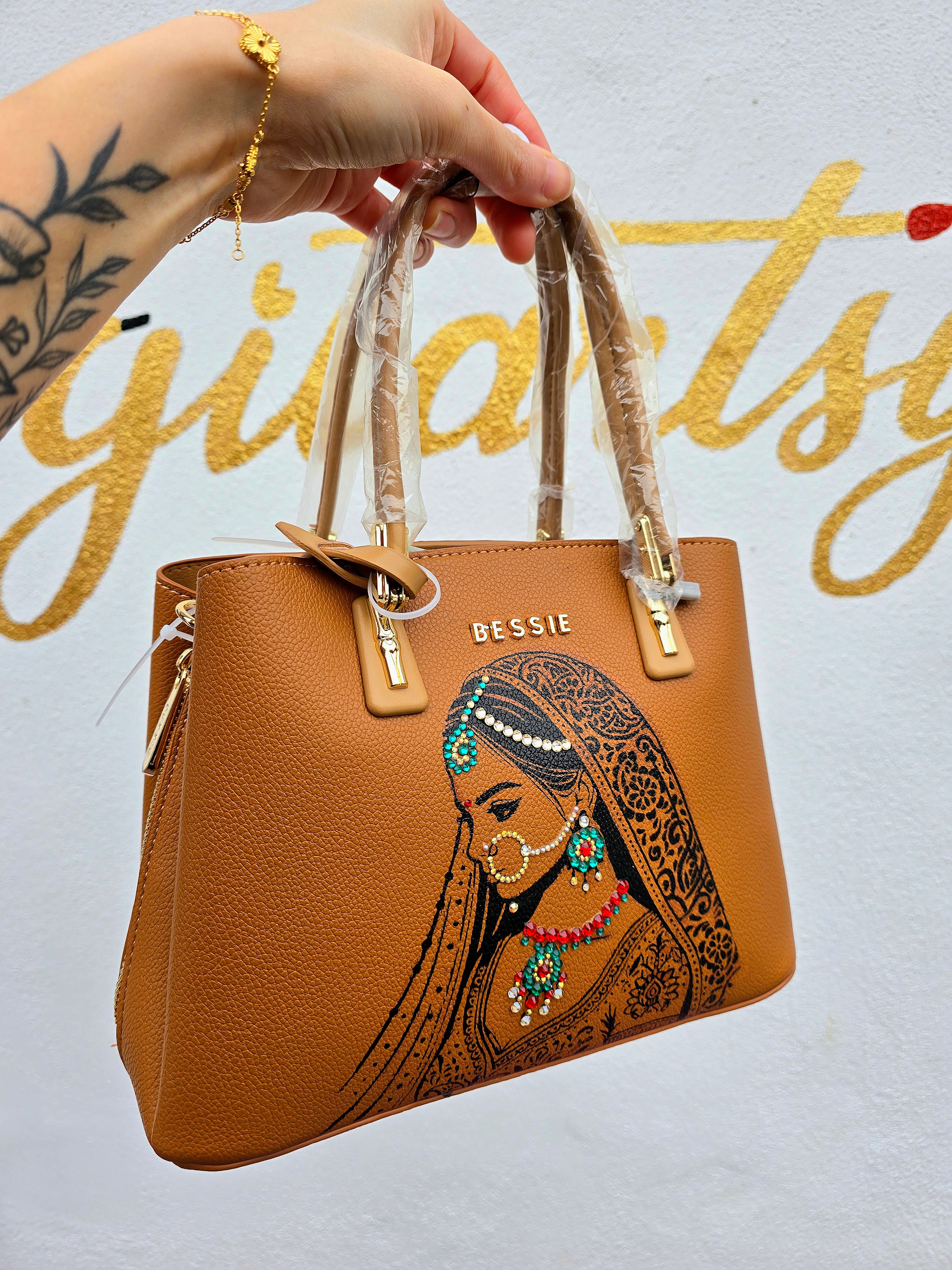 Hand painted bessie London tan brown bag with indian bride illustration and shiny crsystals and rhinestones on the jewellery 