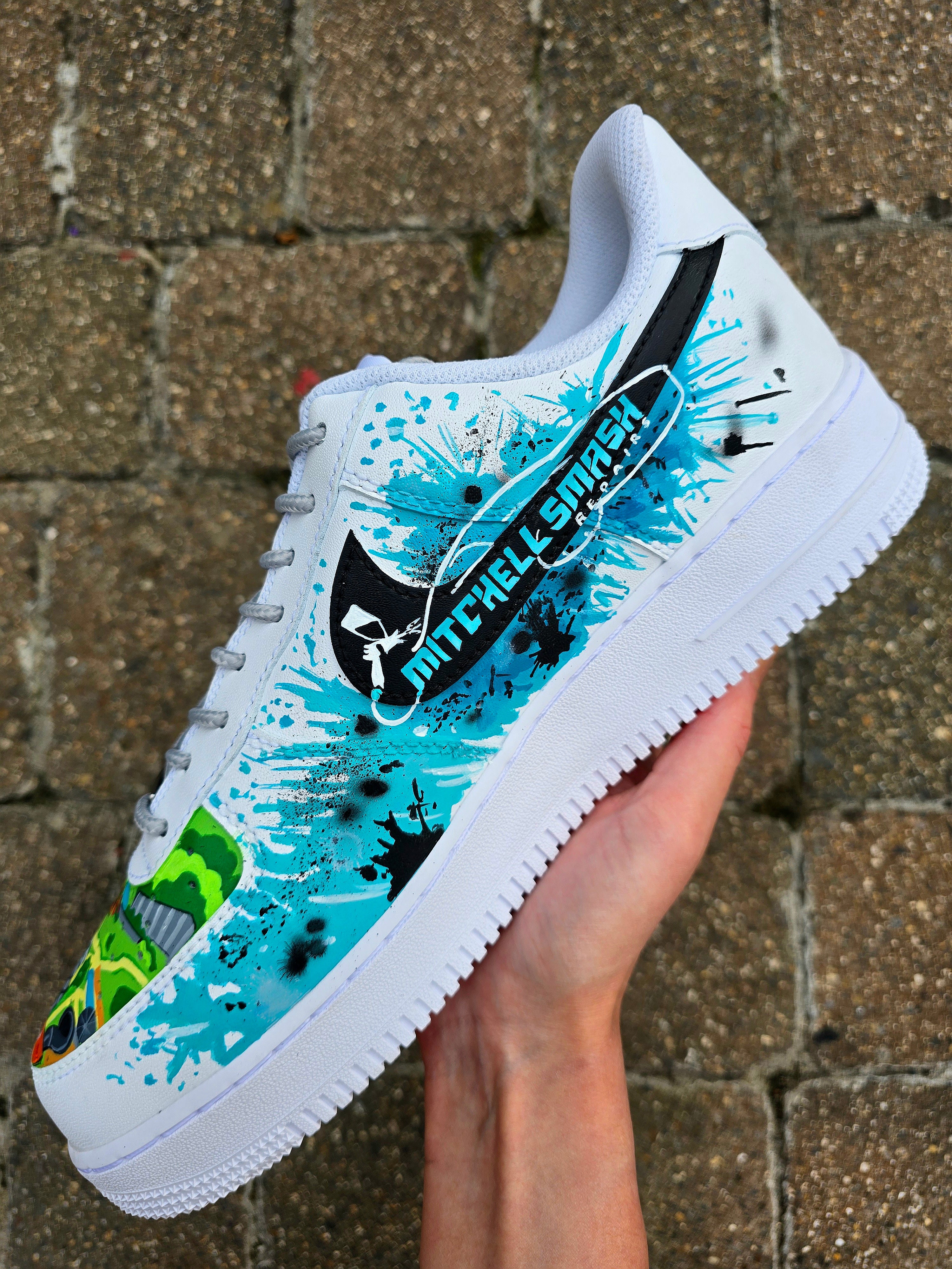 Custom hand-painted Nike Air Force 1 sneakers featuring a Lamborghini-inspired design 🏎️ and spray painter artwork 🎨. Created by Gitartsy using premium leather paints, sealed for durability, and fully customisable with personal details such as car models, colors, and text. Perfect for car enthusiasts 🚗, sneaker collectors 👟, and streetwear lovers seeking one-of-a-kind footwear.

