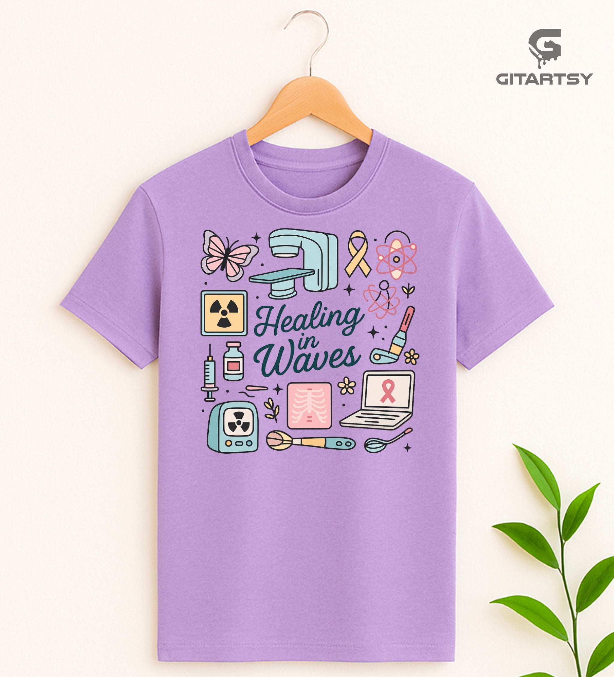 Radiotherapist pastel T-shirt with radiation icons, X-ray machine, and "Healing in Waves" text.