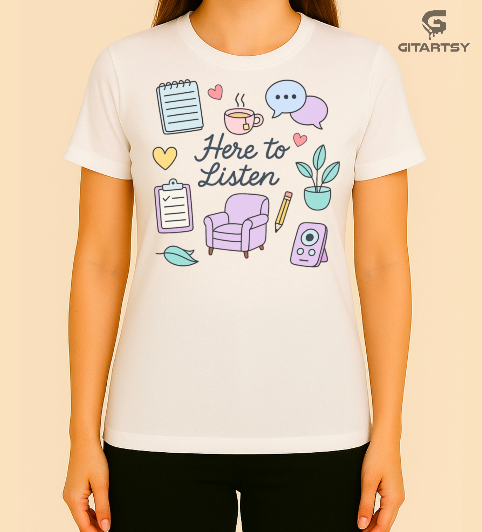 Pastel T-shirt with “Here to Listen” quote and illustrated therapy icons like a chair, speech bubbles, notebook, plant, and heart - ideal for therapists and mental health professionals 