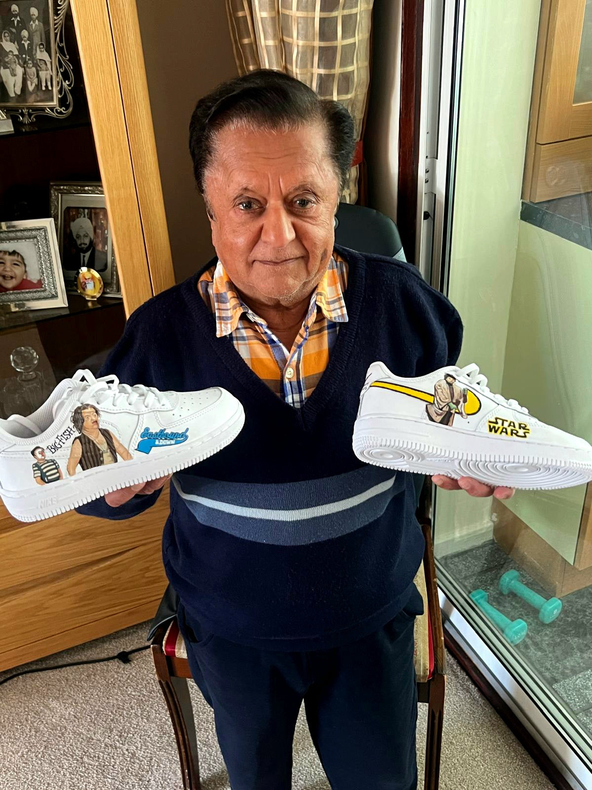 Hollywood actor Deep Roy from charlie and the chocolate factory oompa loompa, star wars etc holding gitartsy custom hand painted sneakers 