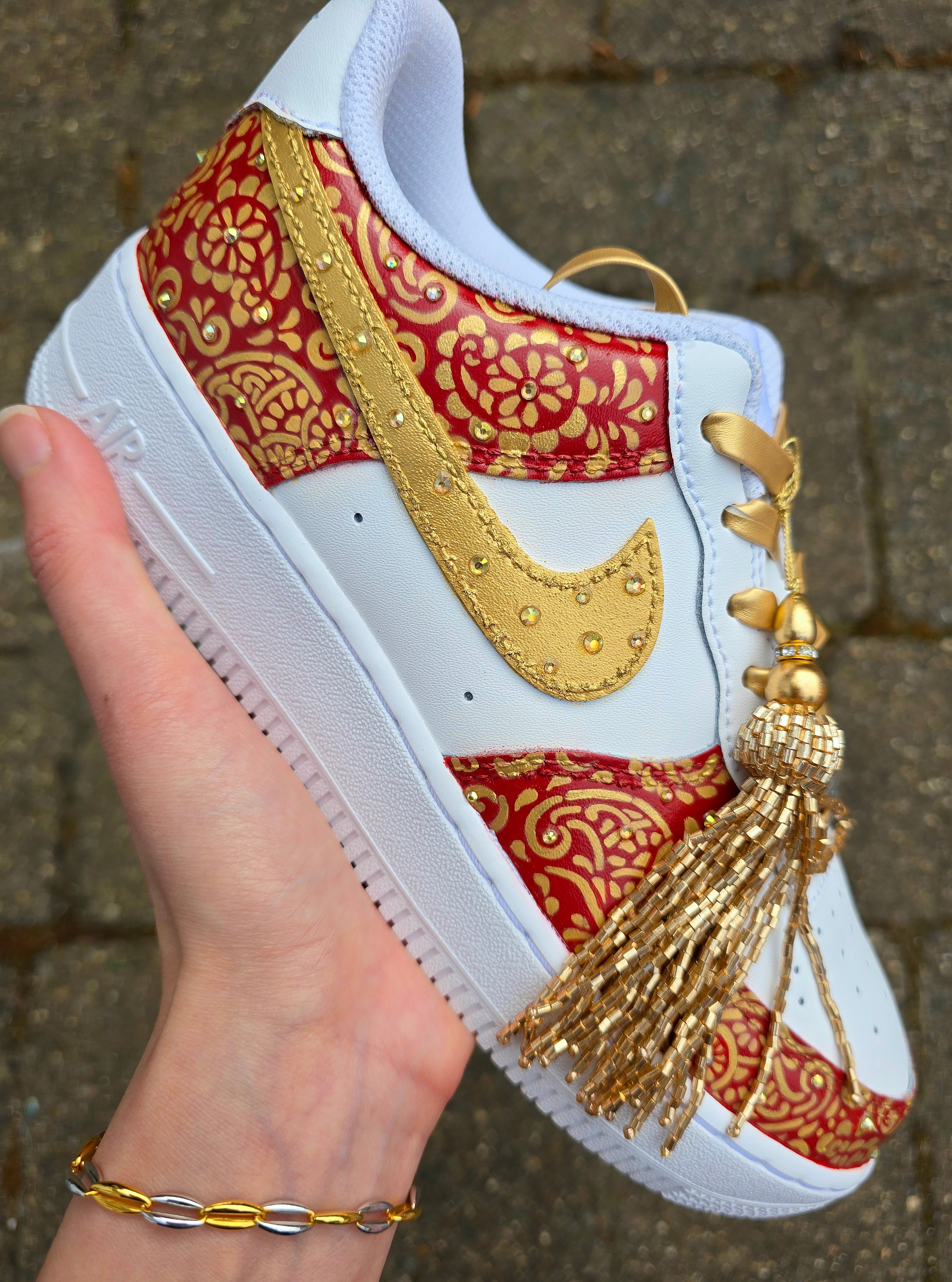 Indian Bridal Wedding Nike AF1 sneakers with crystals -  hand painted with henna mehendi designs in maroon and gold. Topped with rhinestones and paranda 